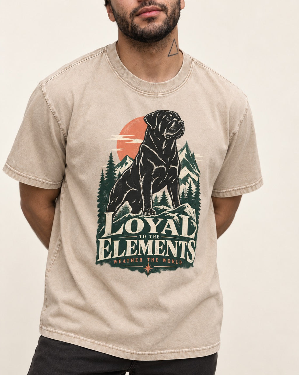 Rottweiler Loyal to the Elements Washed Tee in Apricot, worn by a model, front view