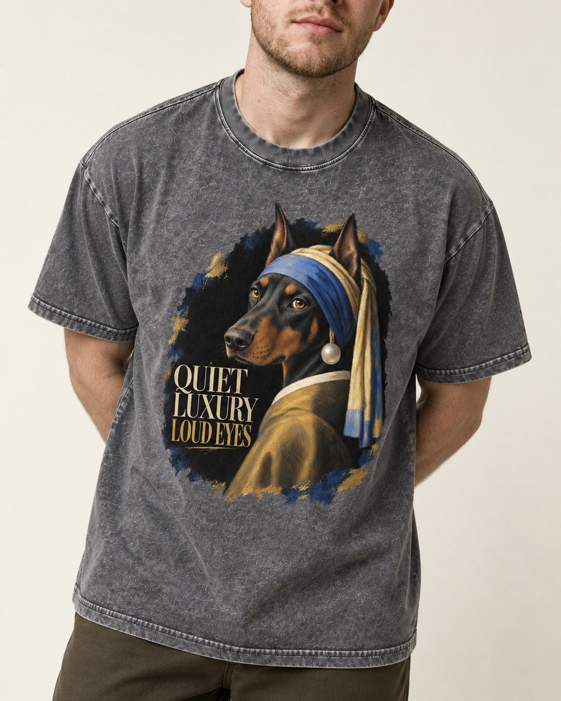 Doberman Quiet Luxury Loud Eyes Pearl Portrait Graphic Washed Tee in Gray, worn by a model, front view