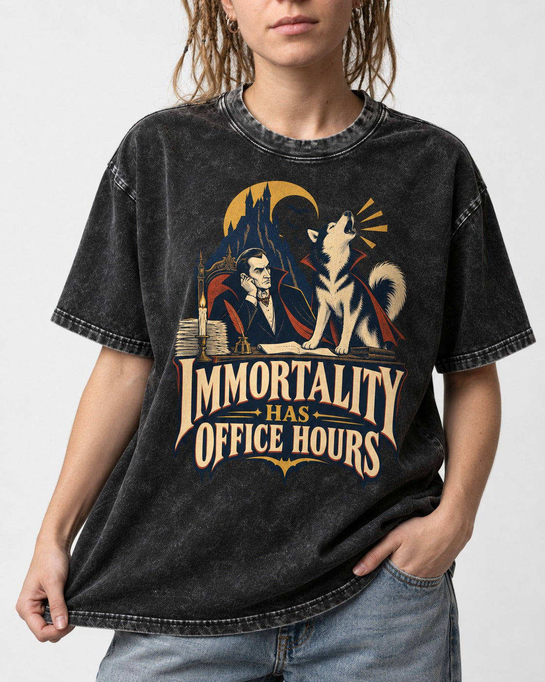 Husky Immortality Has Office Hours Vampire Office Graphic Washed Tee in Black, worn by a model, front view