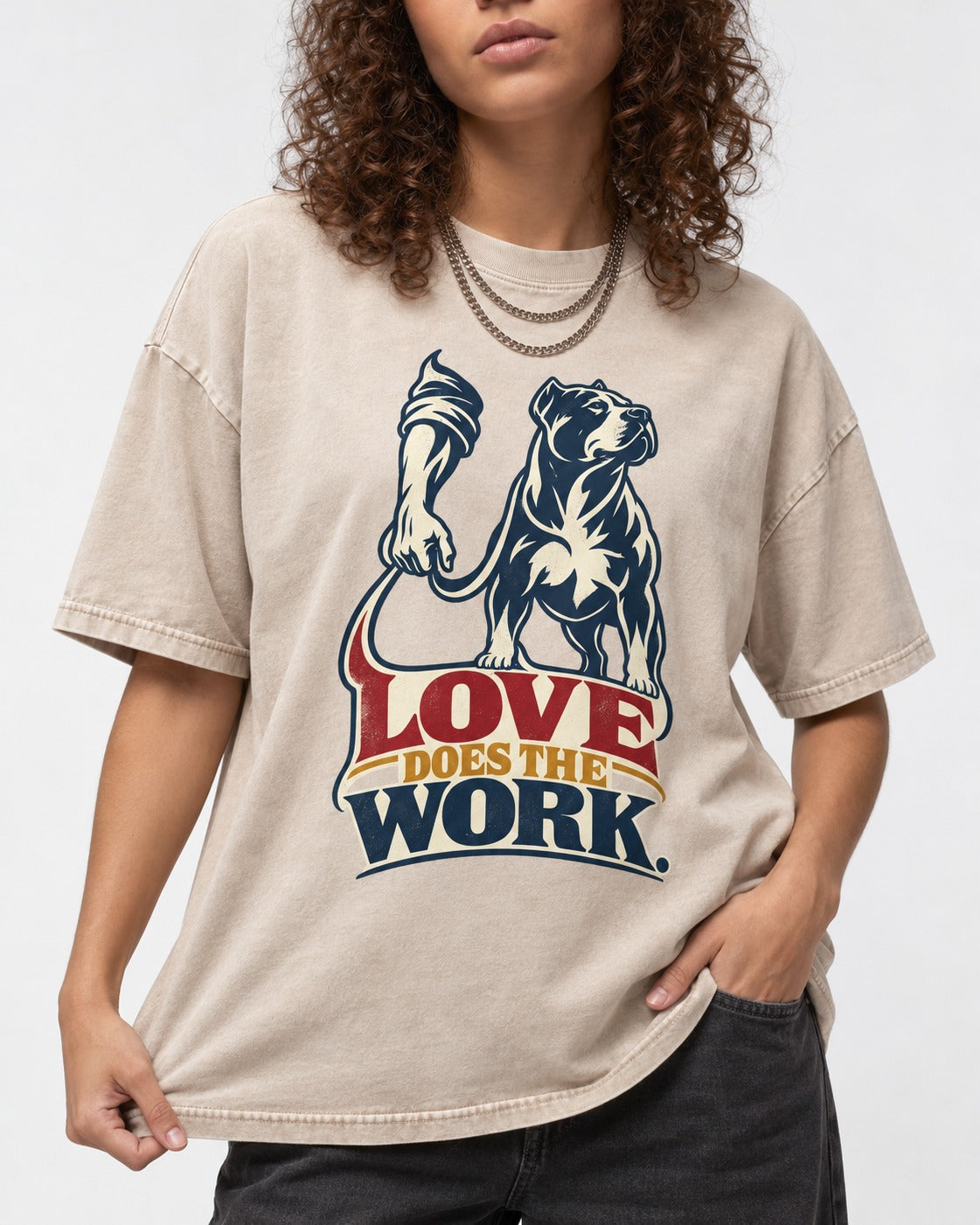 Pitbull Love Does the Work Washed Tee in Apricot, worn by a model, front view