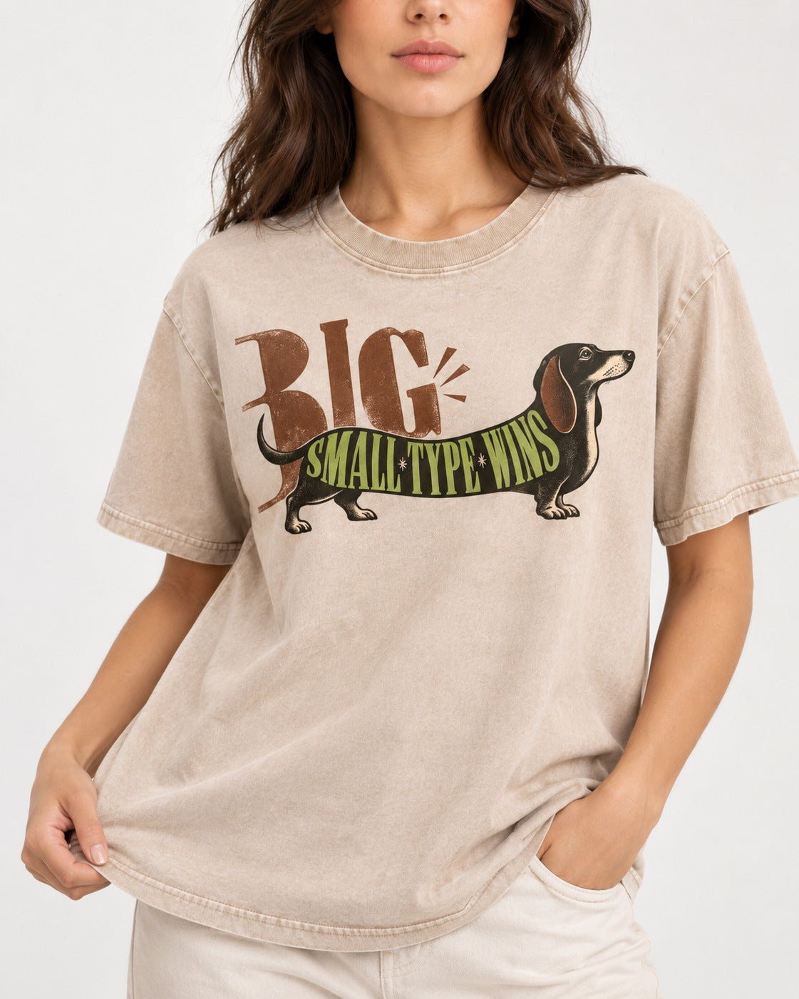 Dachshund Small Type Wins Washed Tee in Apricot, worn by a model, front view