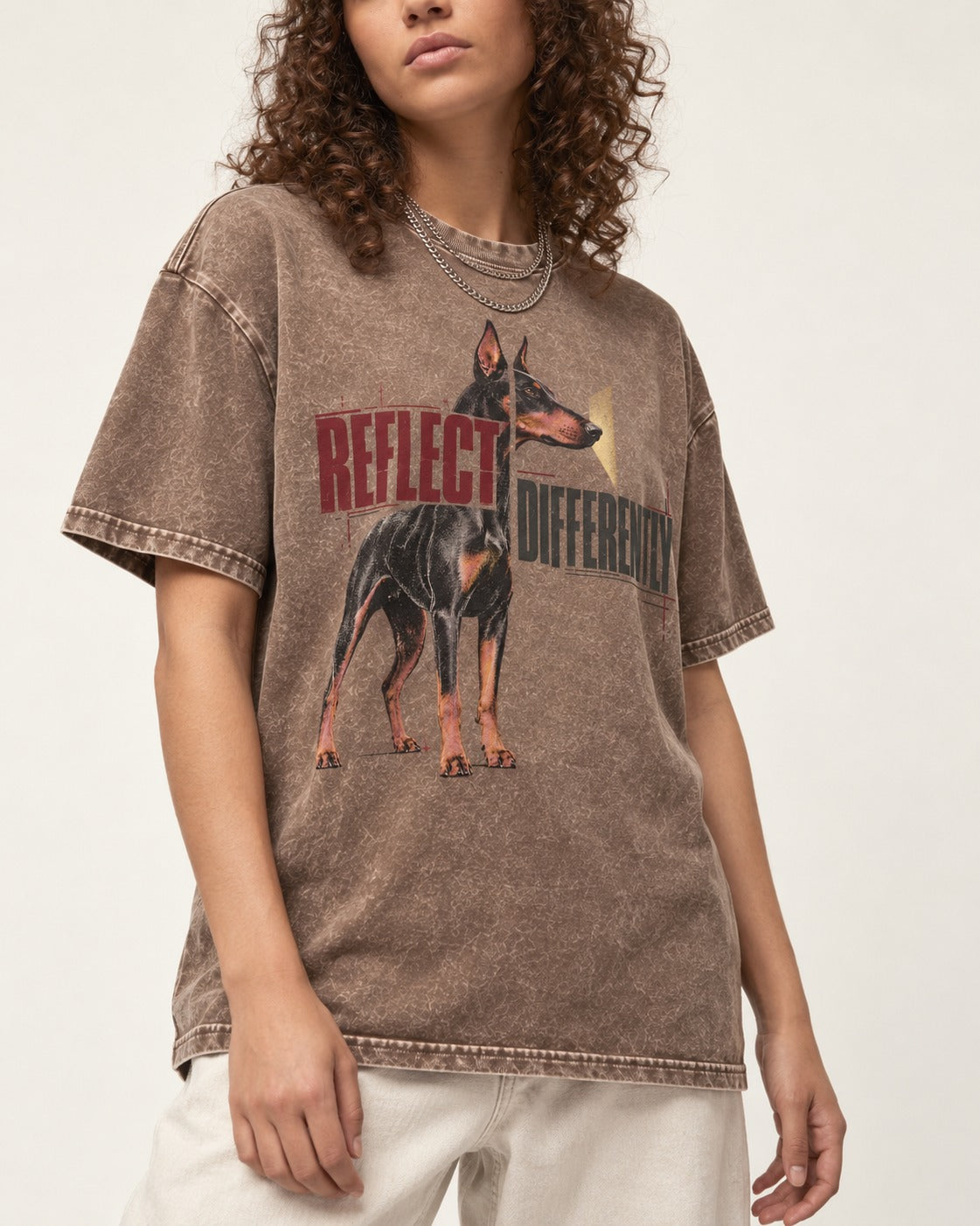 Doberman Reflects Differently Washed Tee in Coffee, worn by a model, front view