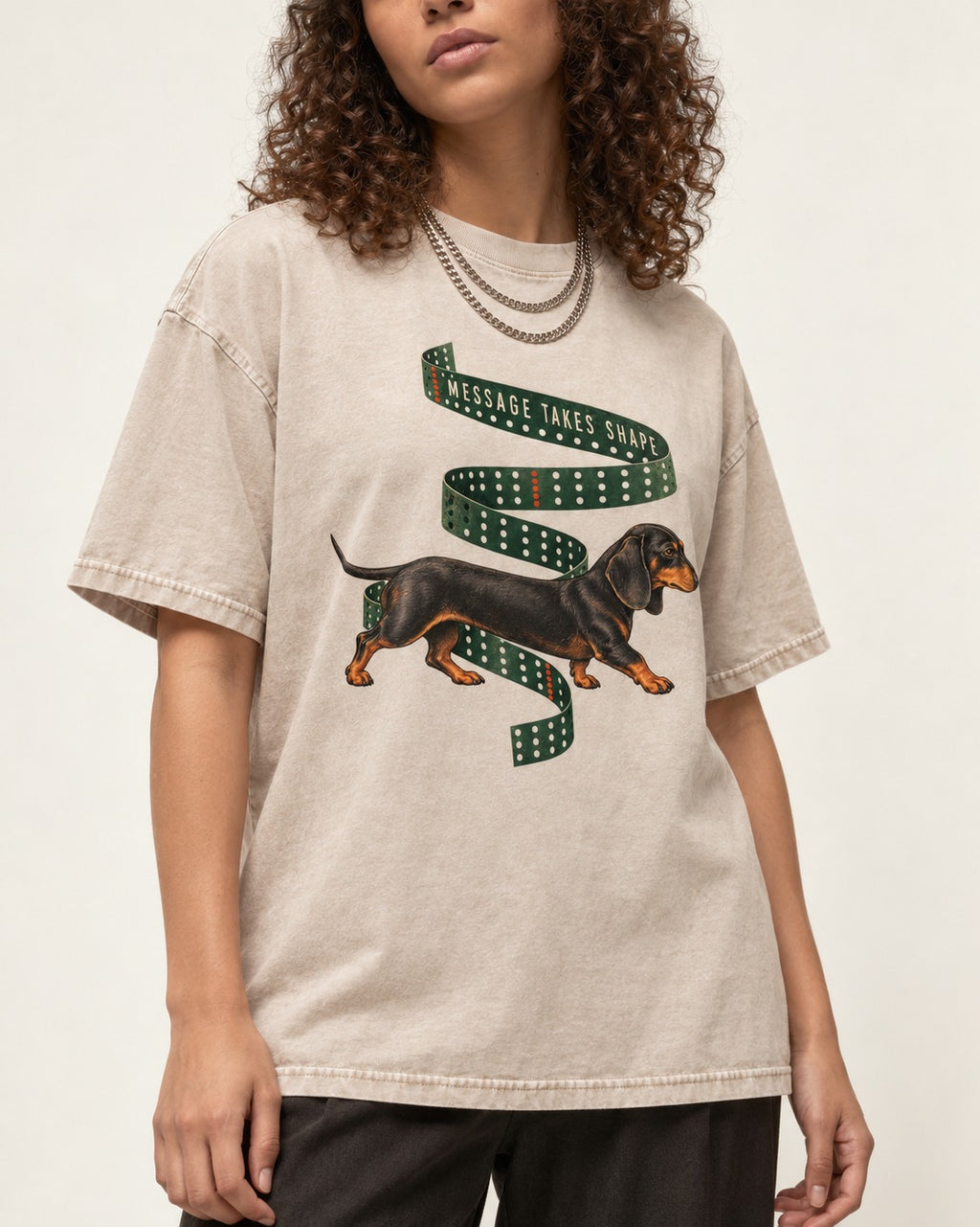 Dachshund Message Takes Shape Washed Tee in Apricot, worn by a model, front view