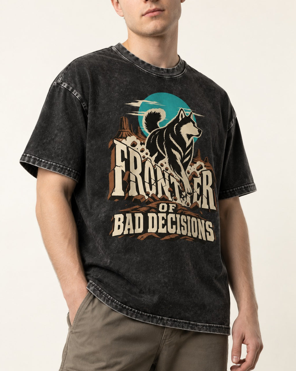 Husky Frontier of Bad Decisions Desert Graphic Washed Tee in Black, worn by a model, front view