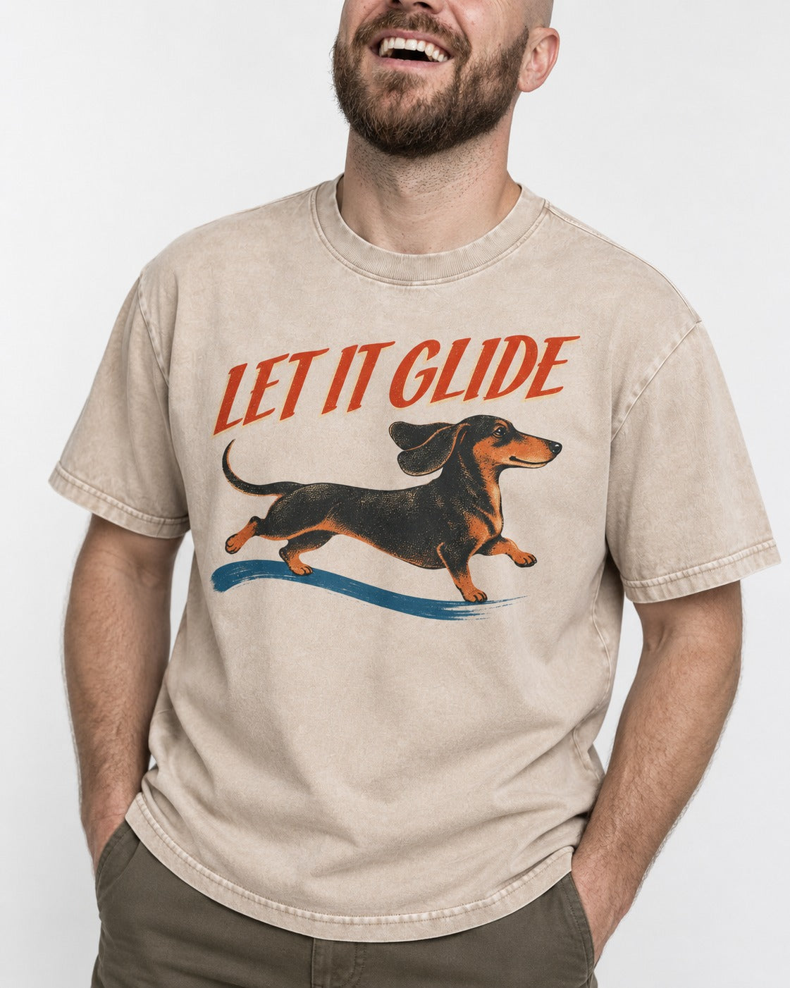 Let It Glide Dachshund Washed Tee in Apricot, worn by a model, front view