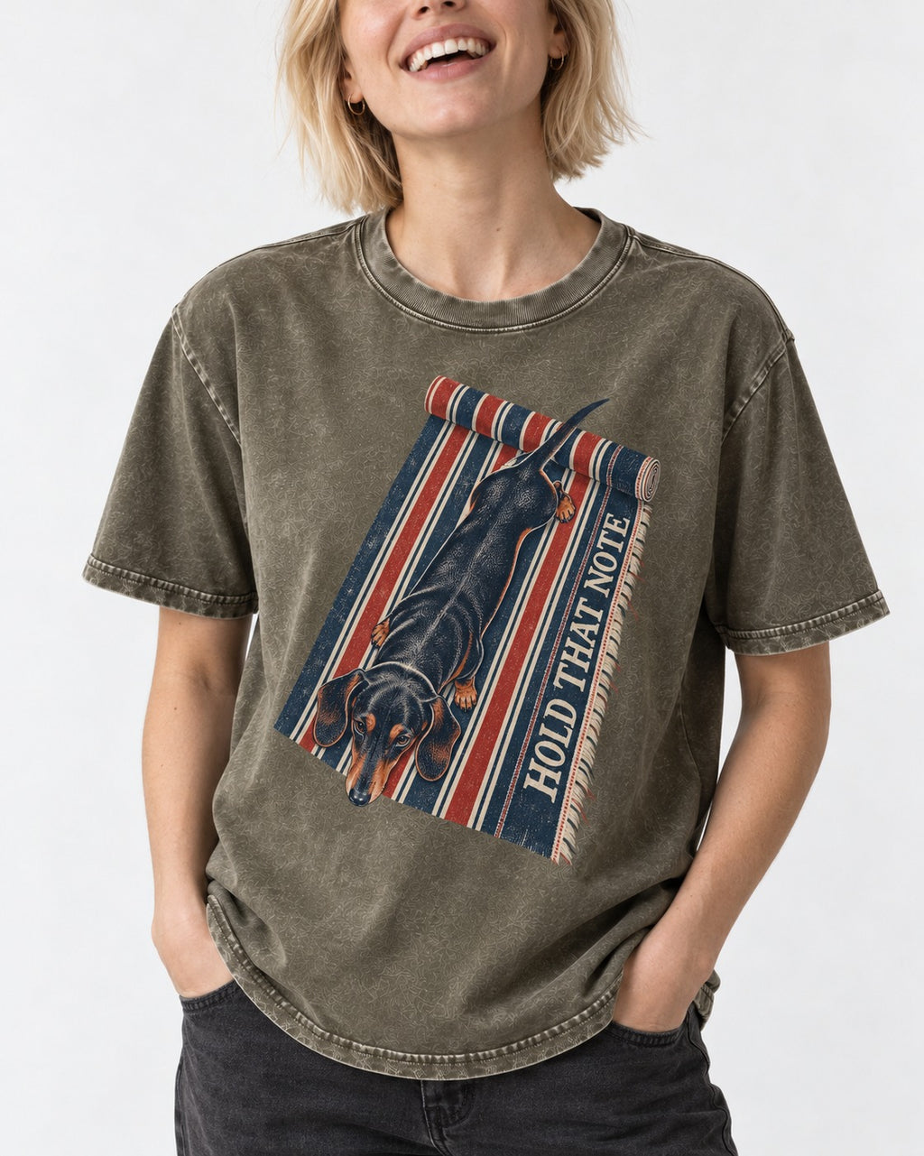 Dachshund Hold That Note Striped Rug Graphic Washed Tee in Army Green, worn by a model, front view