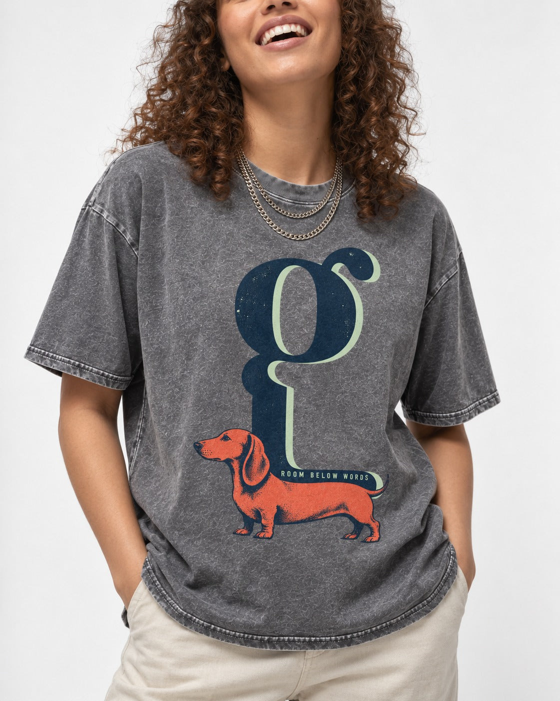 Dachshund Room Below Words Lowercase G Graphic Washed Tee in Gray, worn by a model, front view