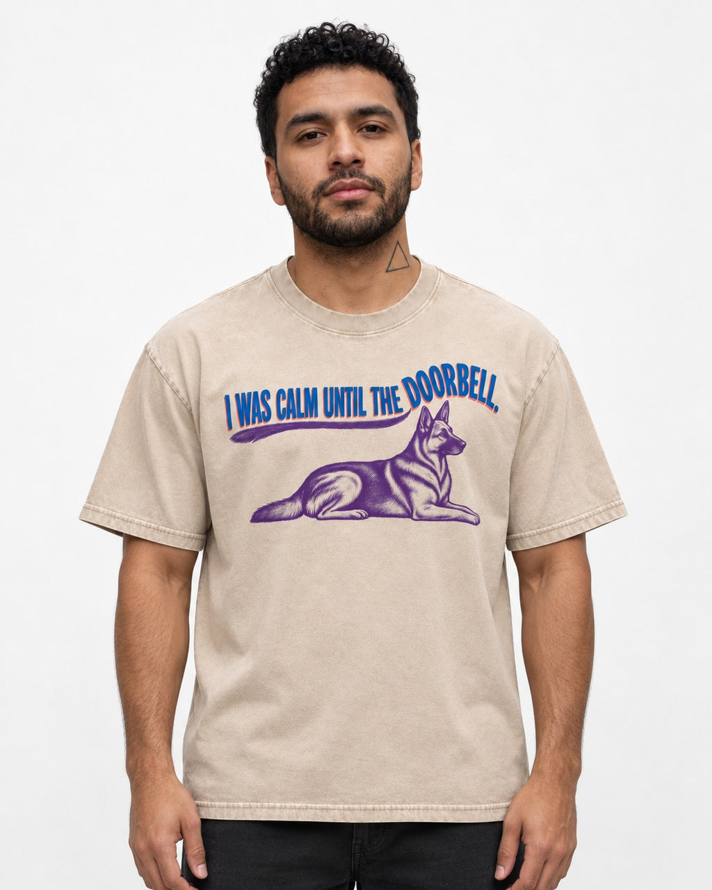 German Shepherd Dog Calm Until the Doorbell Washed Tee in Apricot, worn by a model