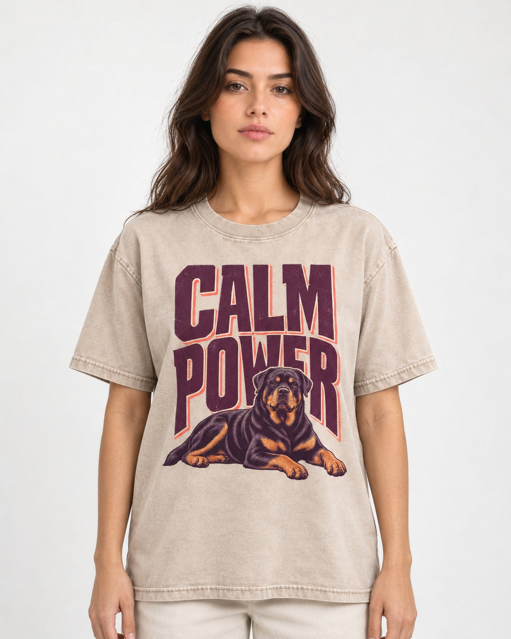 Rottweiler Calm Power Resting Dog Graphic Washed Tee in Apricot, worn by a model