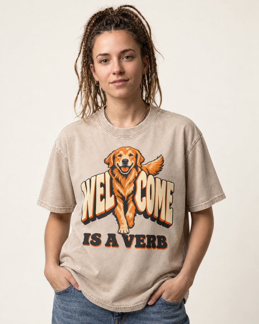 Golden Retriever Welcome Is a Verb Washed Tee in Apricot, worn by a model