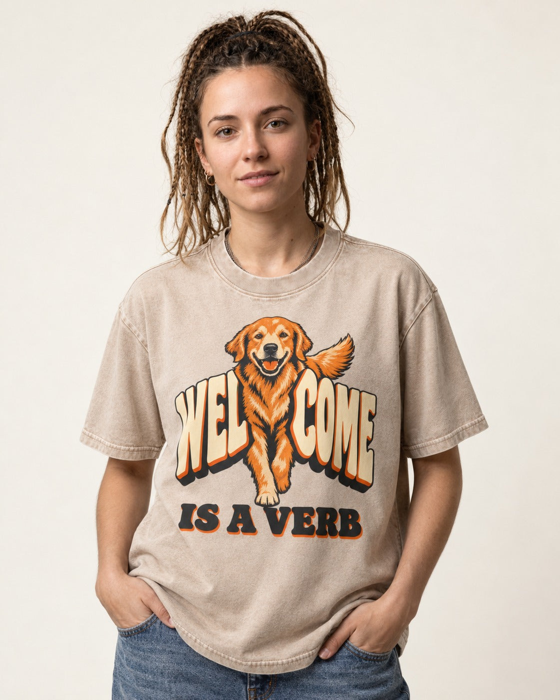 Golden Retriever Welcome Is a Verb Washed Tee in Apricot, worn by a model