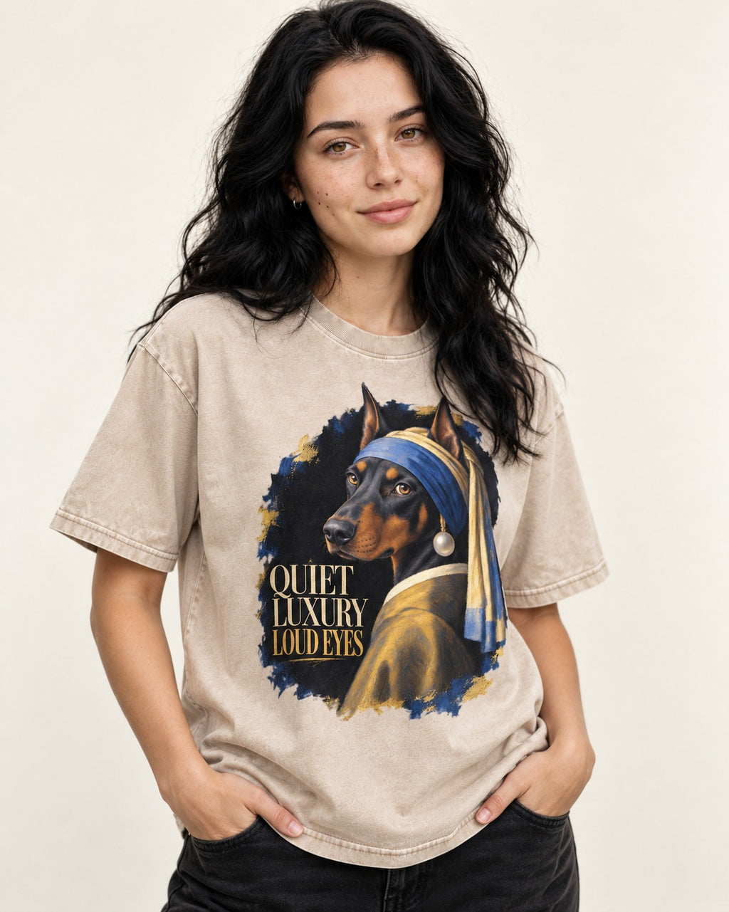 Doberman Quiet Luxury Loud Eyes Pearl Portrait Graphic Washed Tee in Apricot, worn by a model