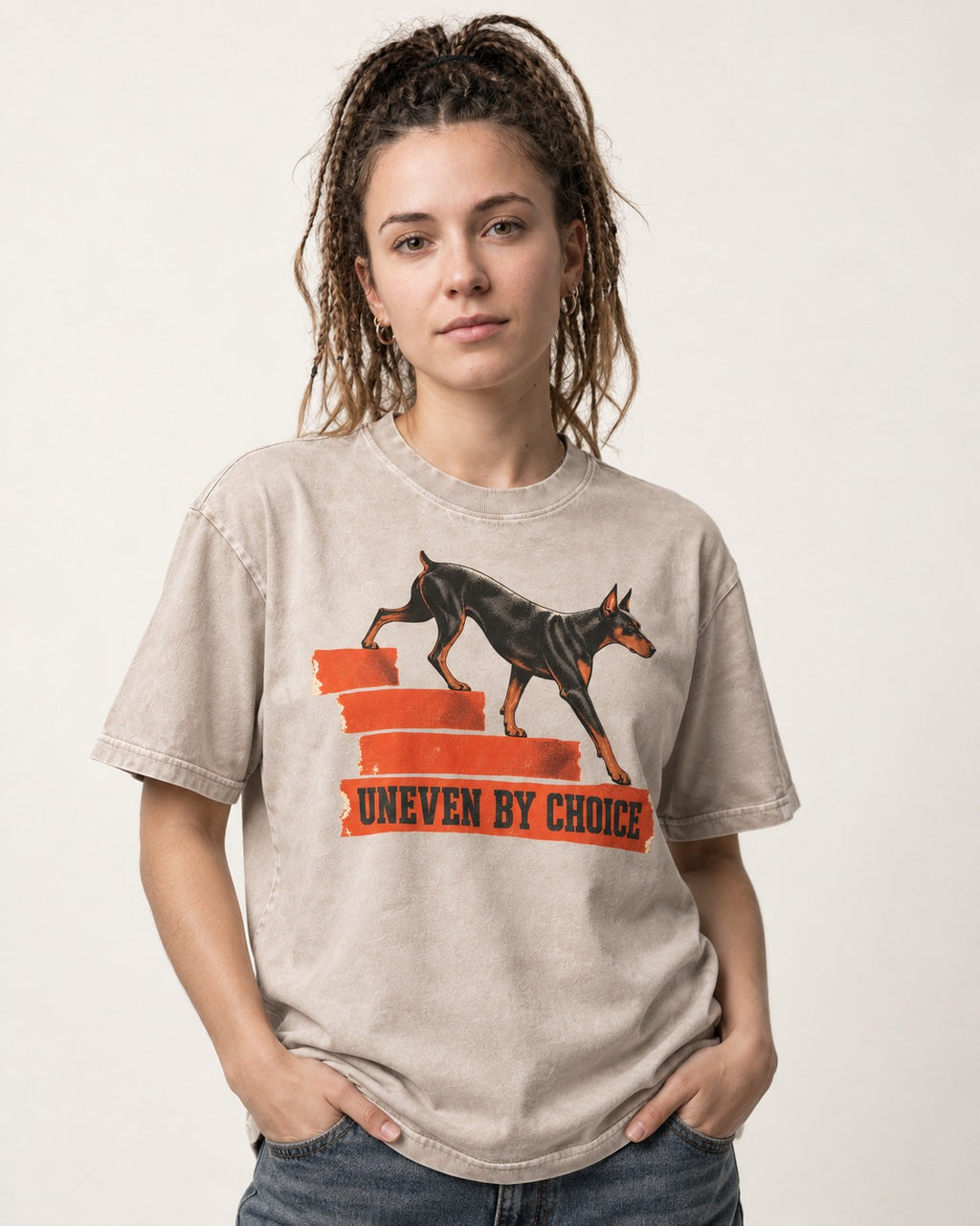 Doberman Uneven by Choice Stair Graphic Washed Tee in Apricot, worn by a model