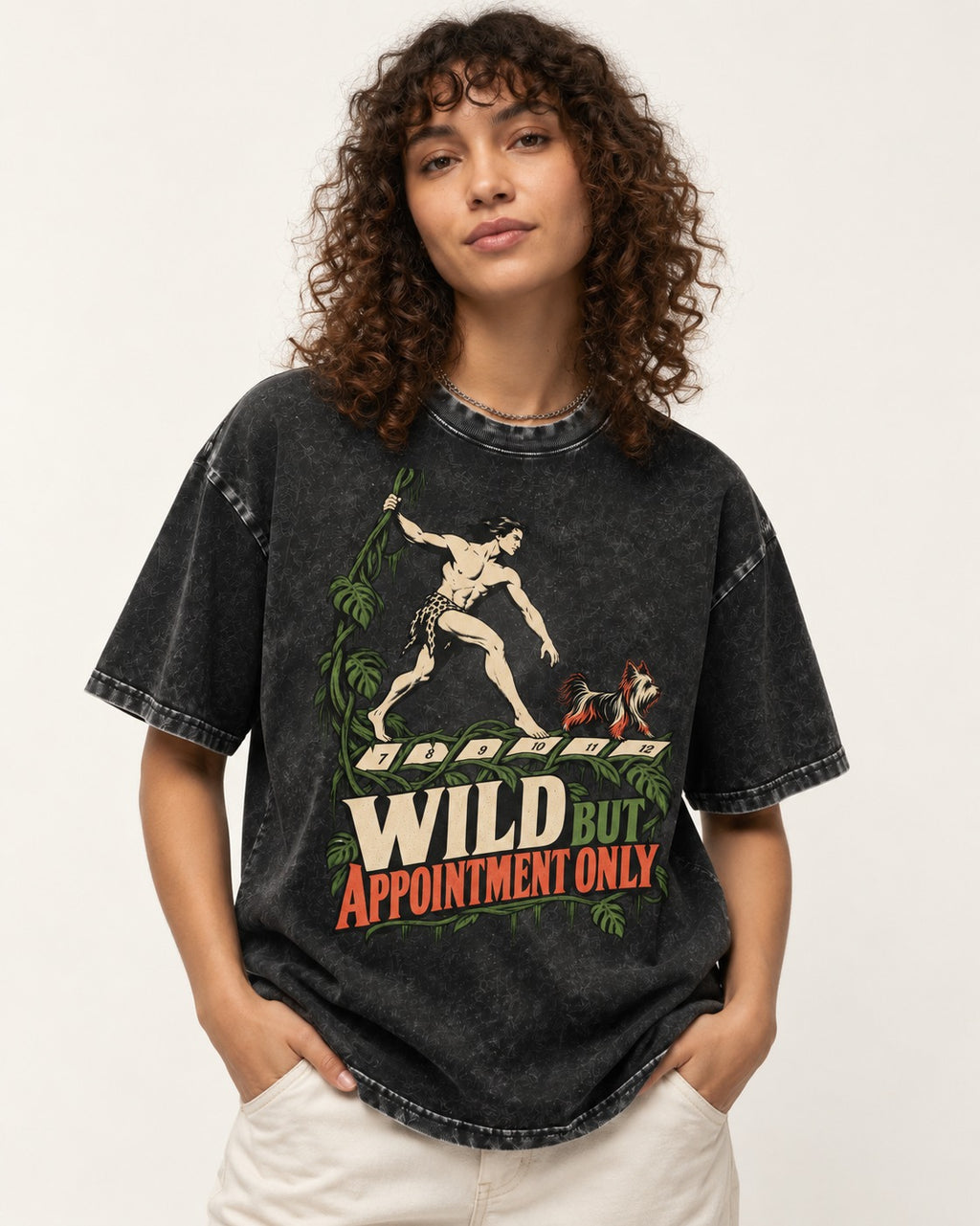Yorkshire Terrier Wild but Appointment Only Jungle Calendar Graphic Washed Tee in Black, worn by a model