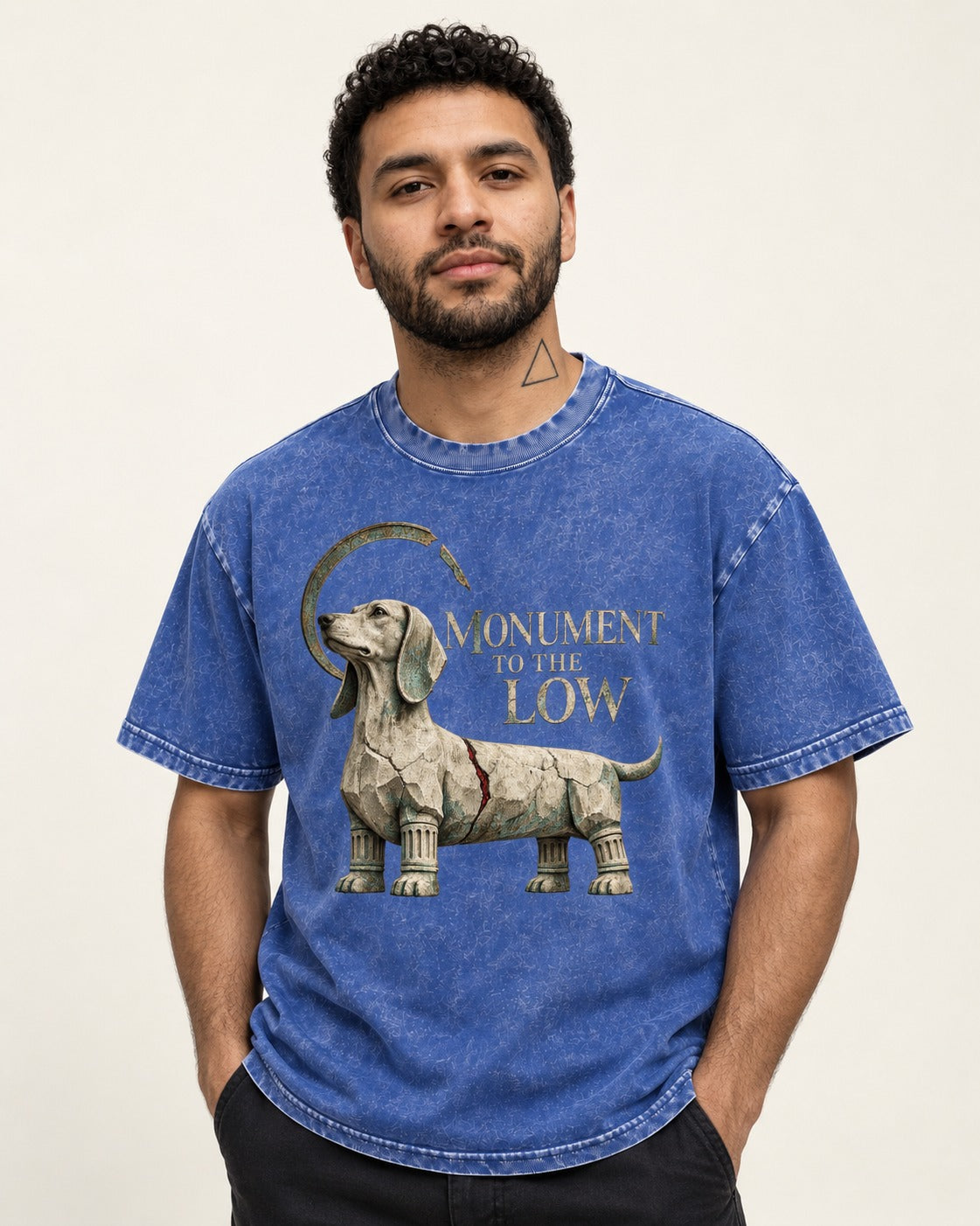 Dachshund Monument to the Low Stone Statue Graphic Washed Tee in Royal Blue, worn by a model