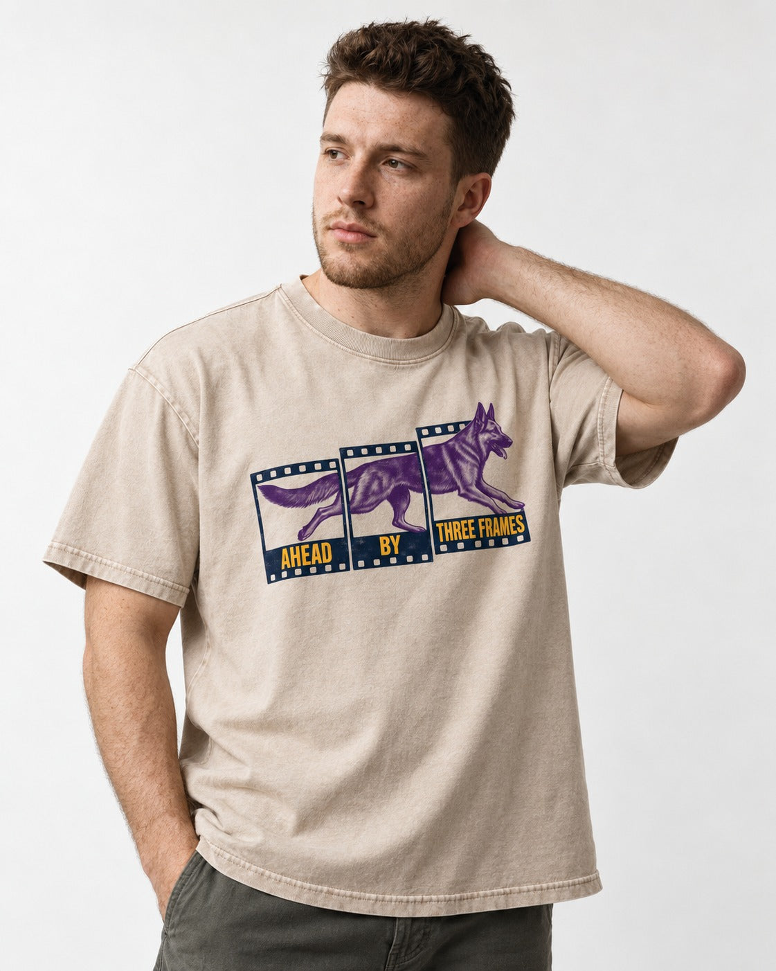 German Shepherd Dog Ahead by Three Frames Washed Tee in Apricot, worn by a model