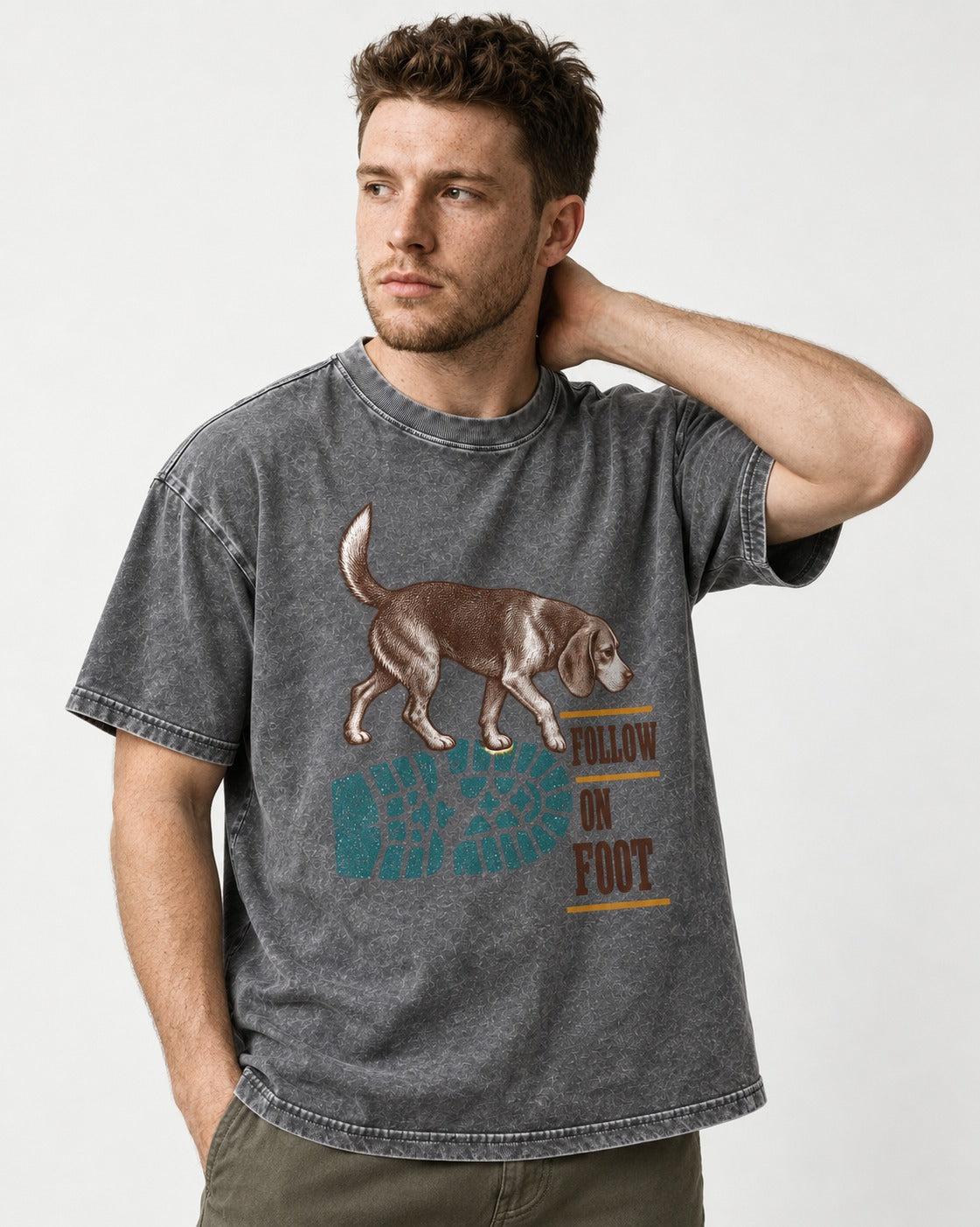 Follow the Beagle on Foot Washed Tee in Gray, worn by a model