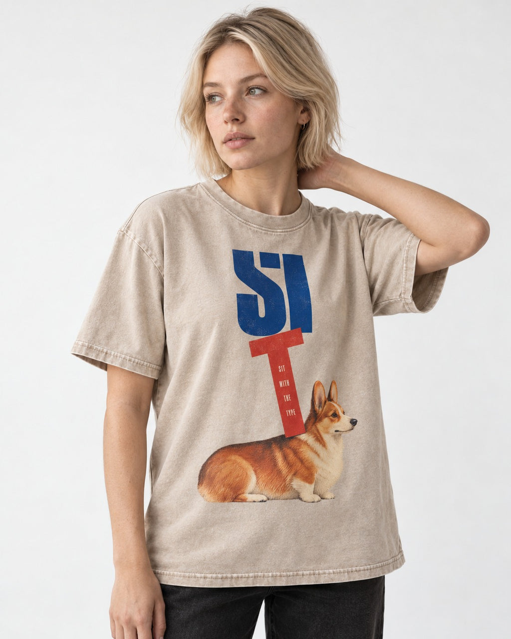 Sit with the Corgi Washed Tee in Apricot, worn by a model