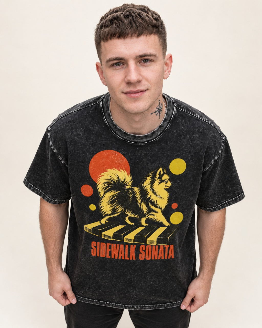 Pomeranian Sidewalk Sonata Piano Graphic Washed Tee in Black, worn by a model