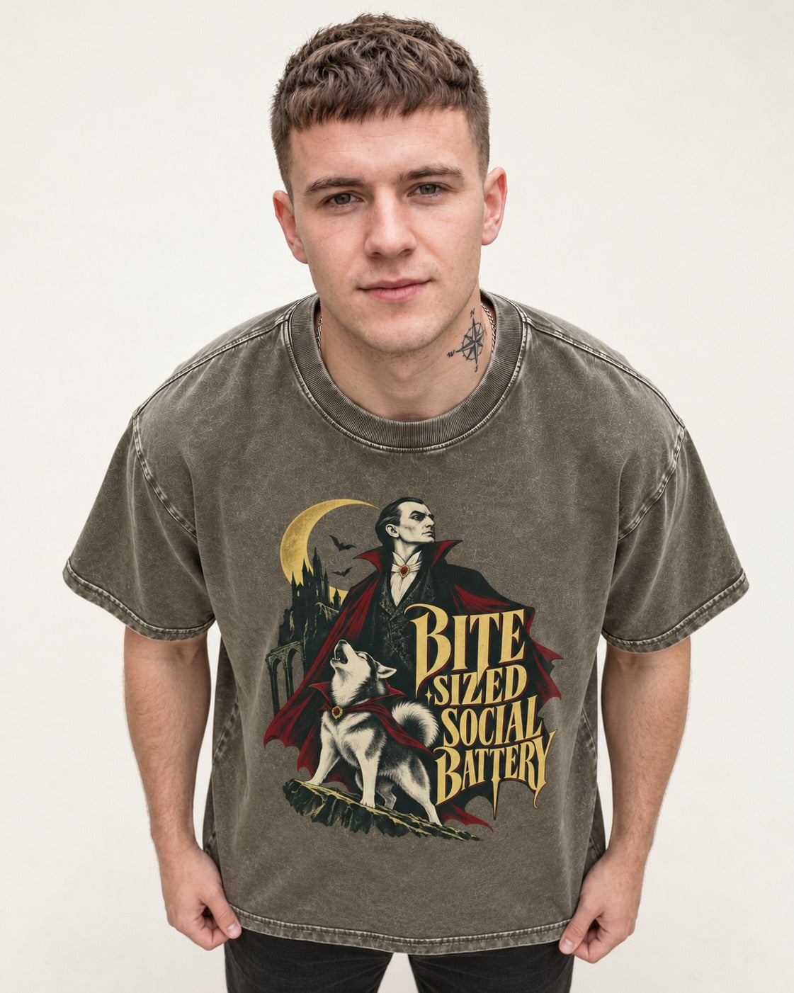 Husky Bite Sized Social Battery Vampire Graphic Washed Tee in Army Green, worn by a model