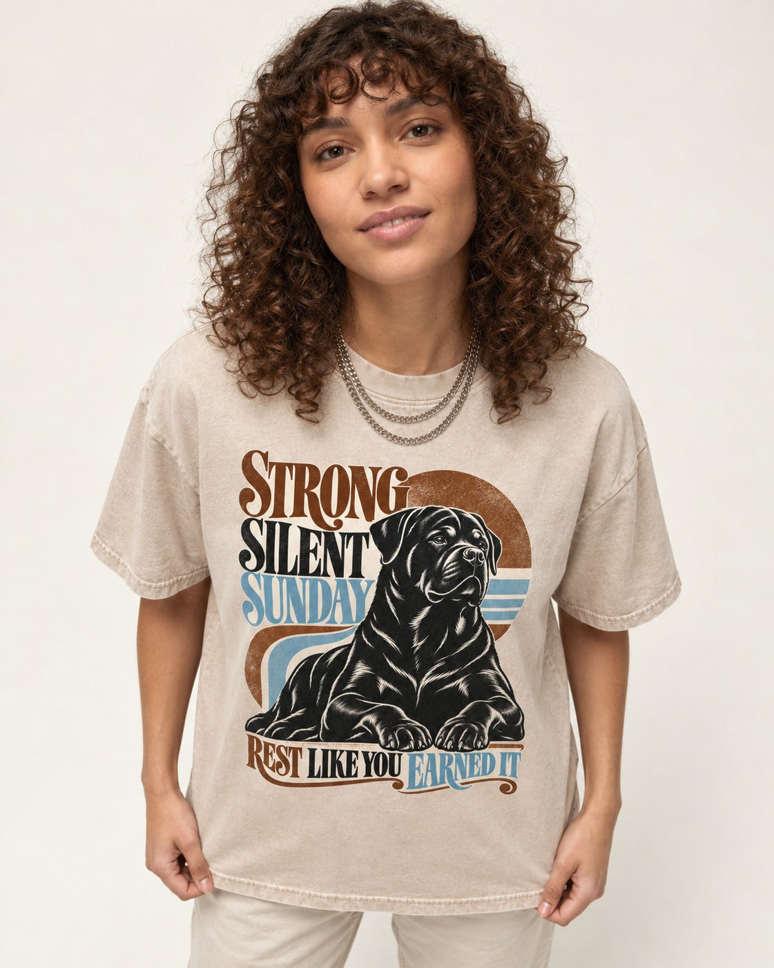 Strong Silent Sunday Rottweiler Washed Tee in Apricot, worn by a model