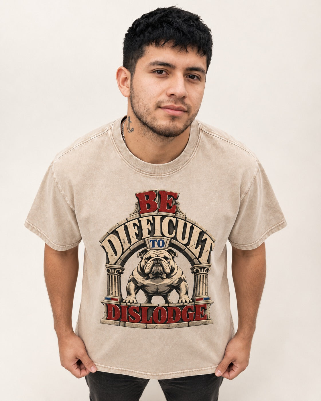 English Bulldog Be Difficult to Dislodge Stone Arch Graphic Washed Tee in Apricot, worn by a model