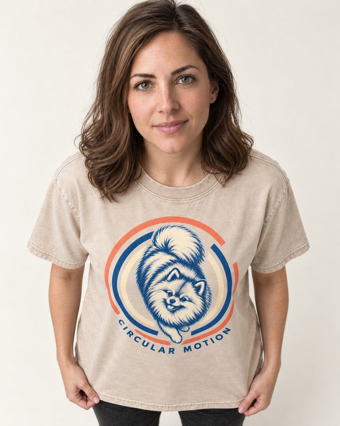 Pomeranian Circular Motion Washed Tee in Apricot, worn by a model