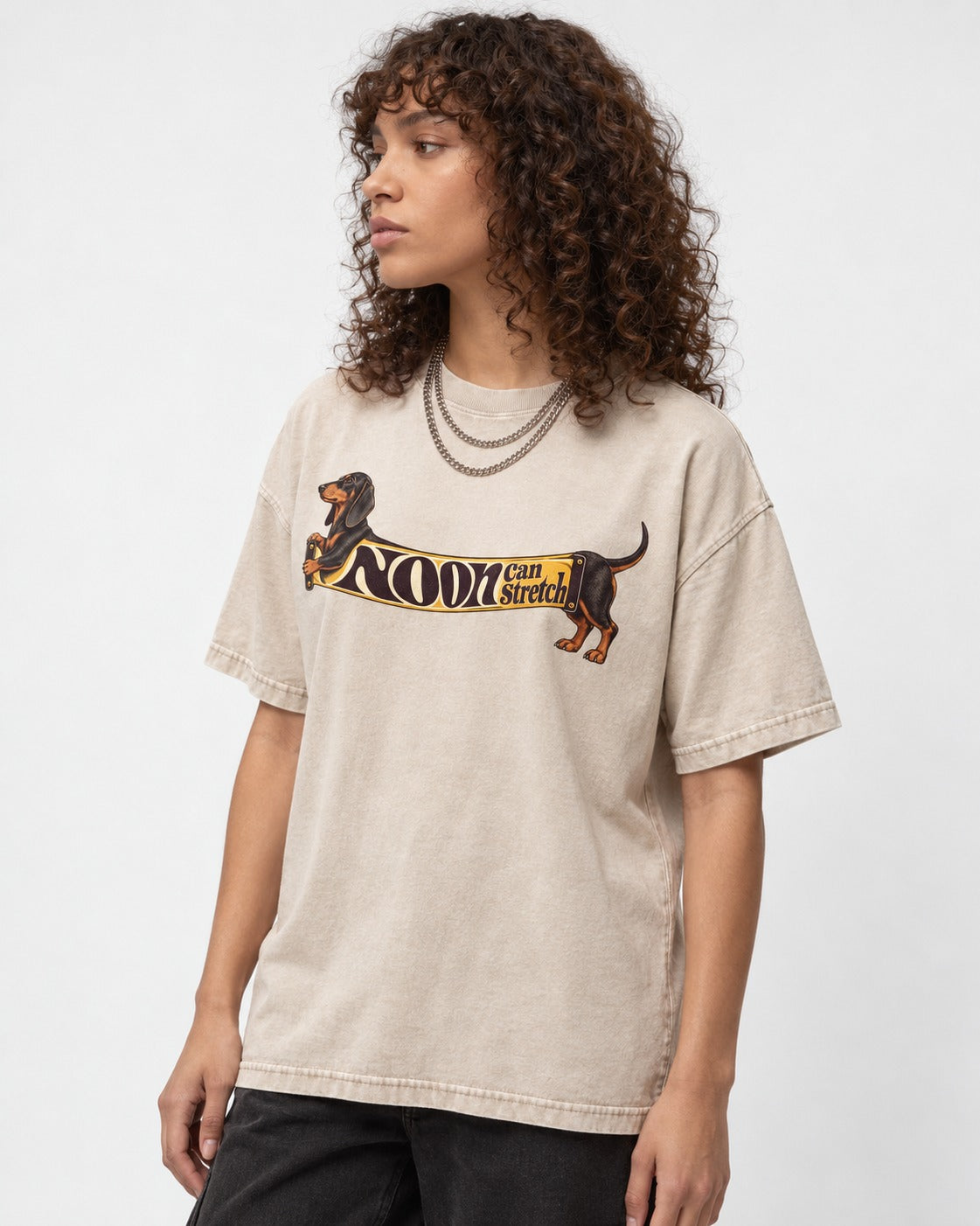 Dachshund Noon Can Stretch Sign Graphic Washed Tee in Apricot, worn by a model