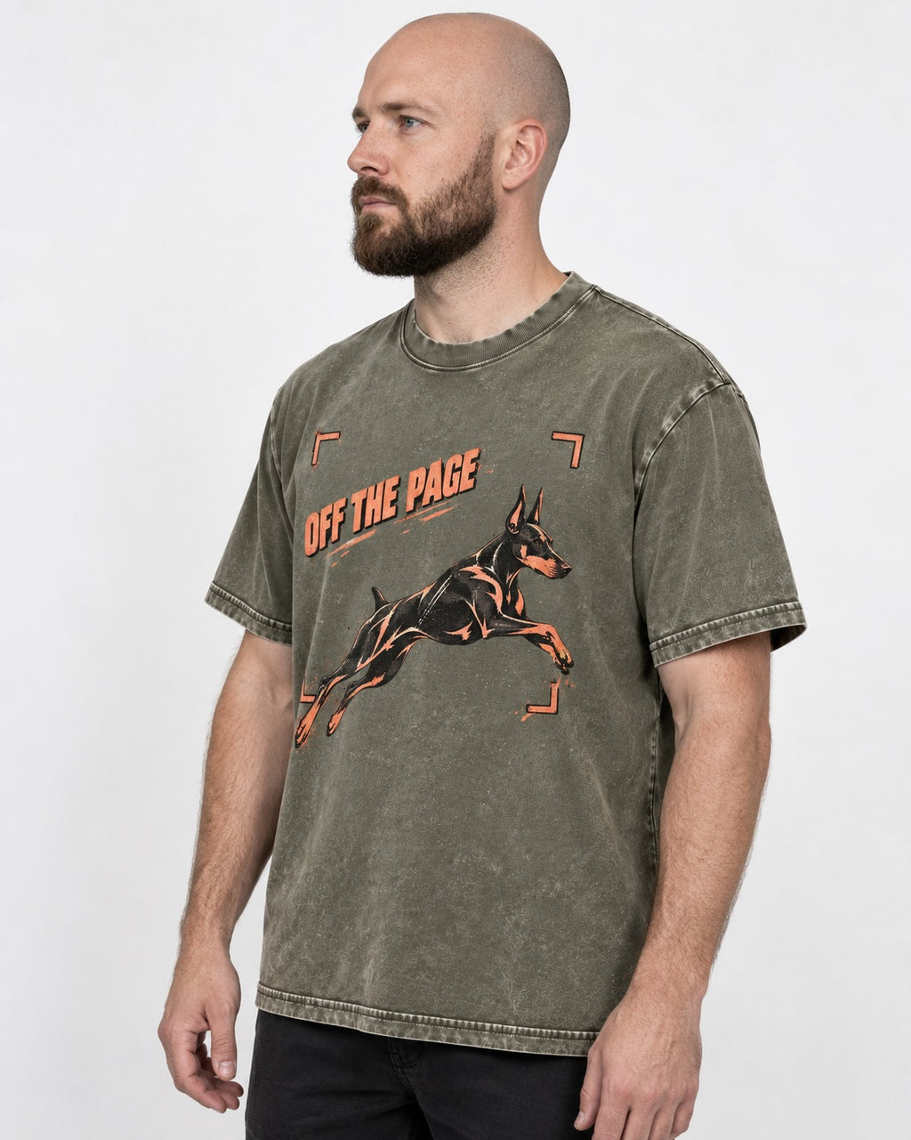Doberman Off the Page Focus Frame Graphic Washed Tee in Army Green, worn by a model