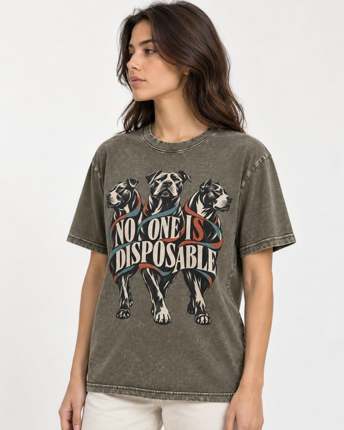 Pitbull No One Is Disposable Three Dogs Graphic Washed Tee in Army Green, worn by a model