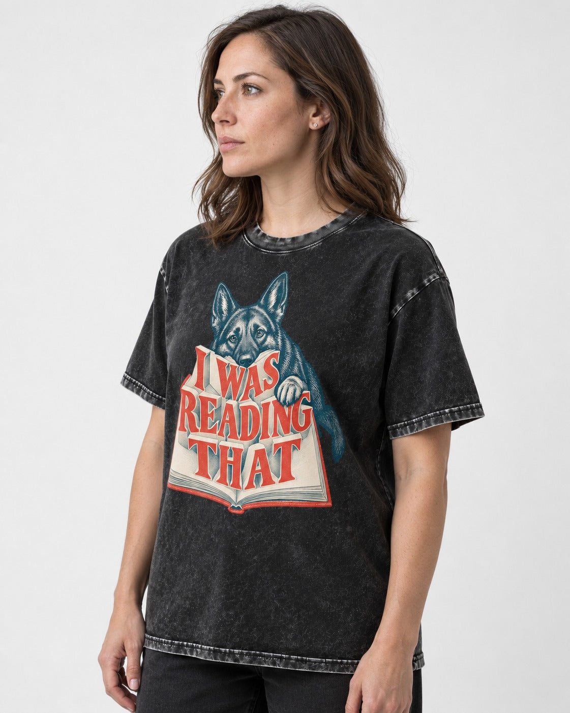German Shepherd Dog I Was Reading That Open Book Graphic Washed Tee in Black, worn by a model