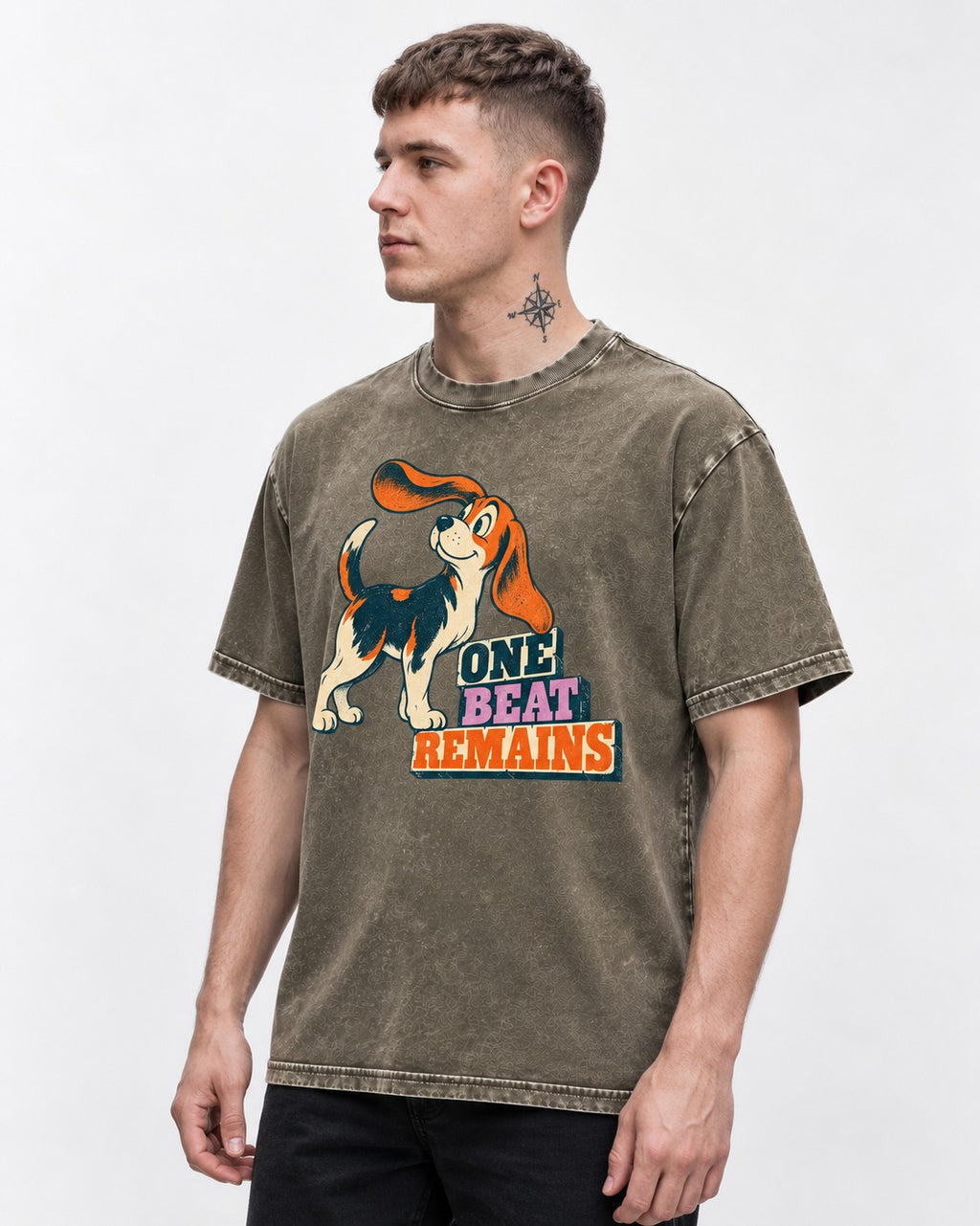 Retro Beagle One Beat Remains Washed Tee in Army Green, worn by a model