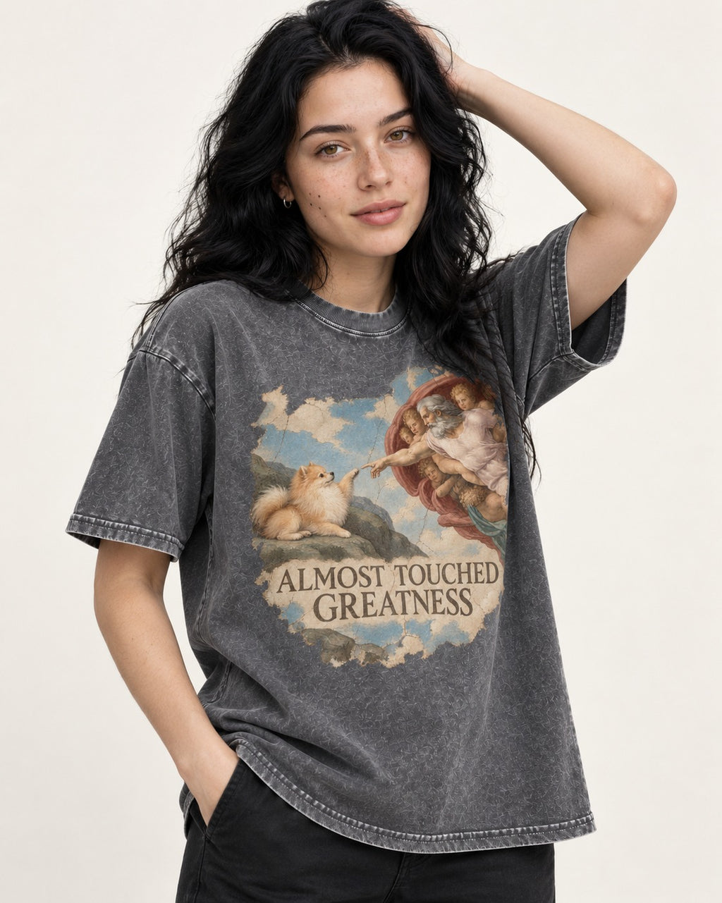 Pomeranian Almost Touched Greatness Fresco Graphic Washed Tee in Gray, worn by a model