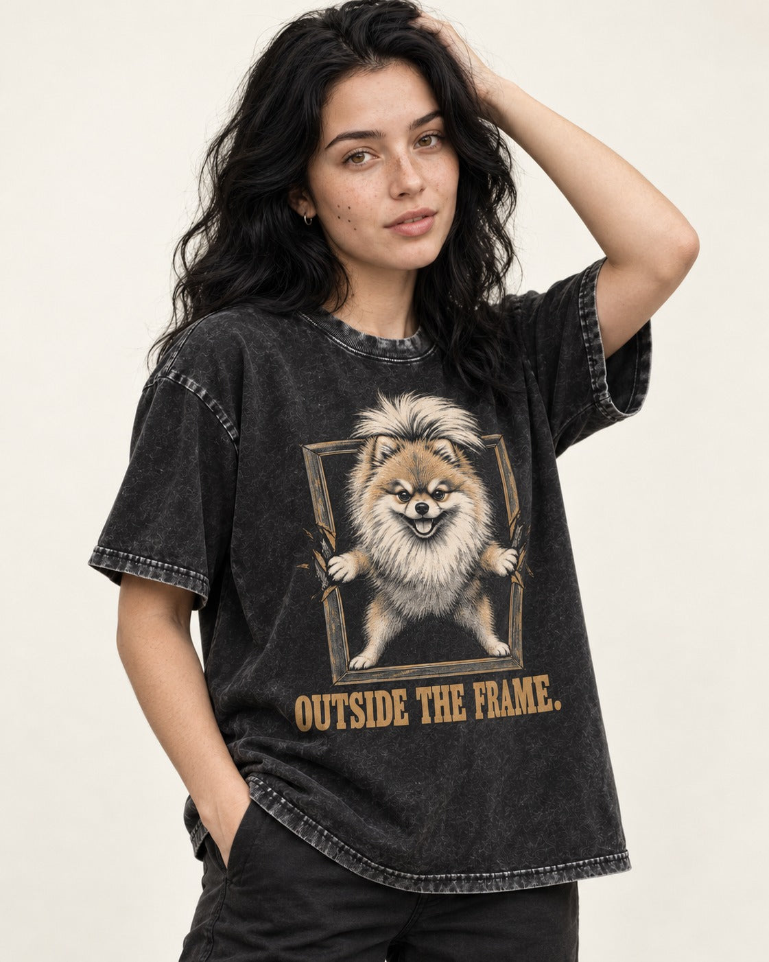 Pomeranian Outside the Frame Breakthrough Graphic Washed Tee in Black, worn by a model