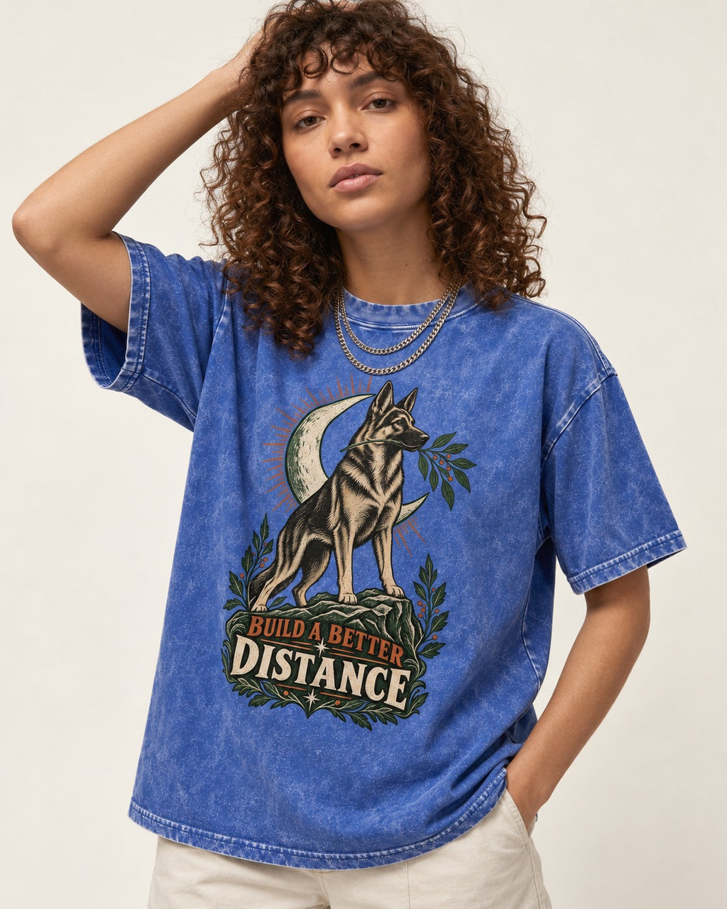 Build A Better Distance Moon Woodcut German Shepherd Dog Graphic Washed Tee in Royal Blue, worn by a model