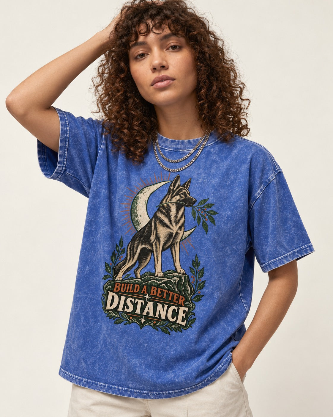 Build A Better Distance Moon Woodcut German Shepherd Dog Graphic Washed Tee in Royal Blue, worn by a model