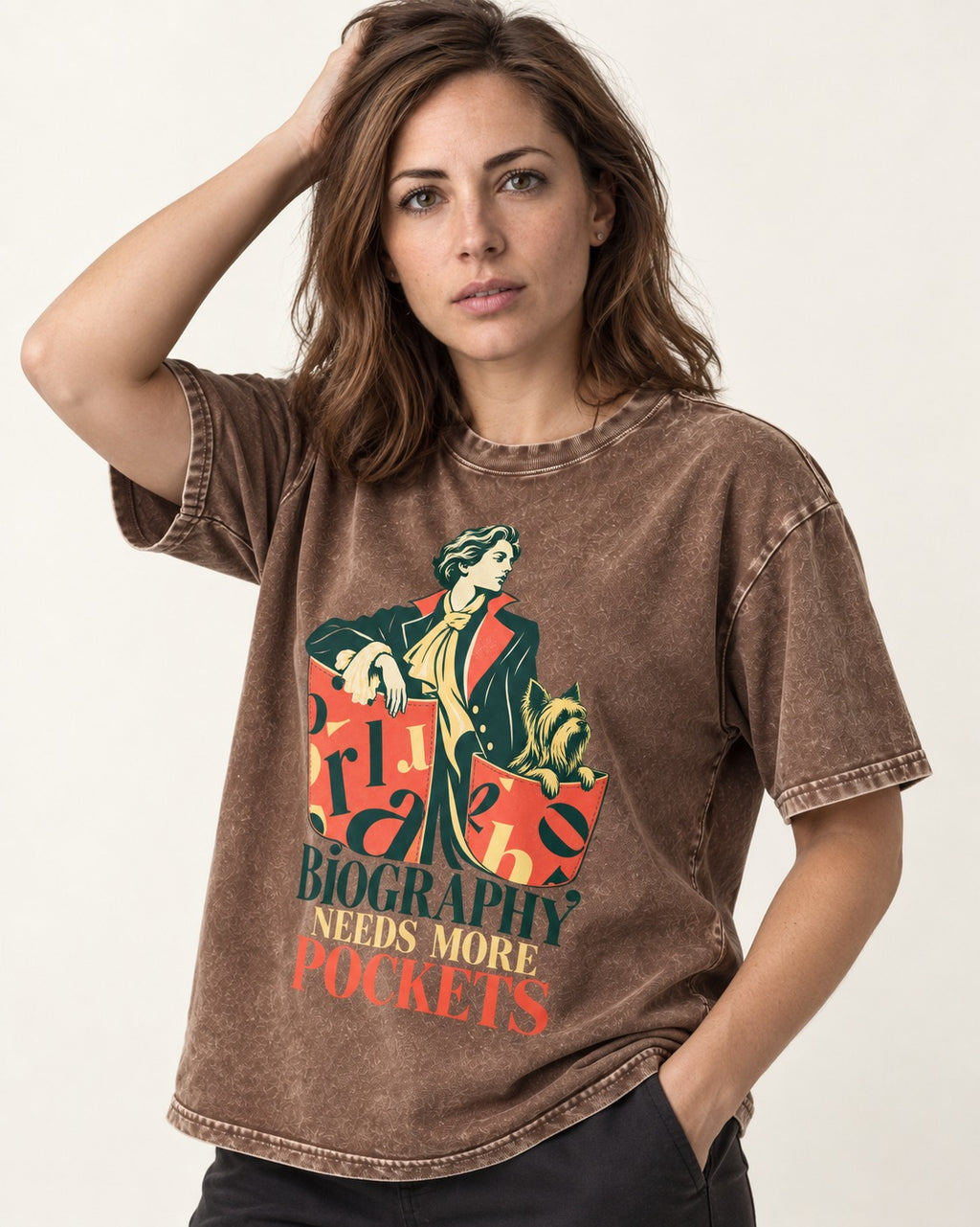 Yorkshire Terrier Biography Needs More Pockets Literary Portrait Graphic Washed Tee in Coffee, worn by a model