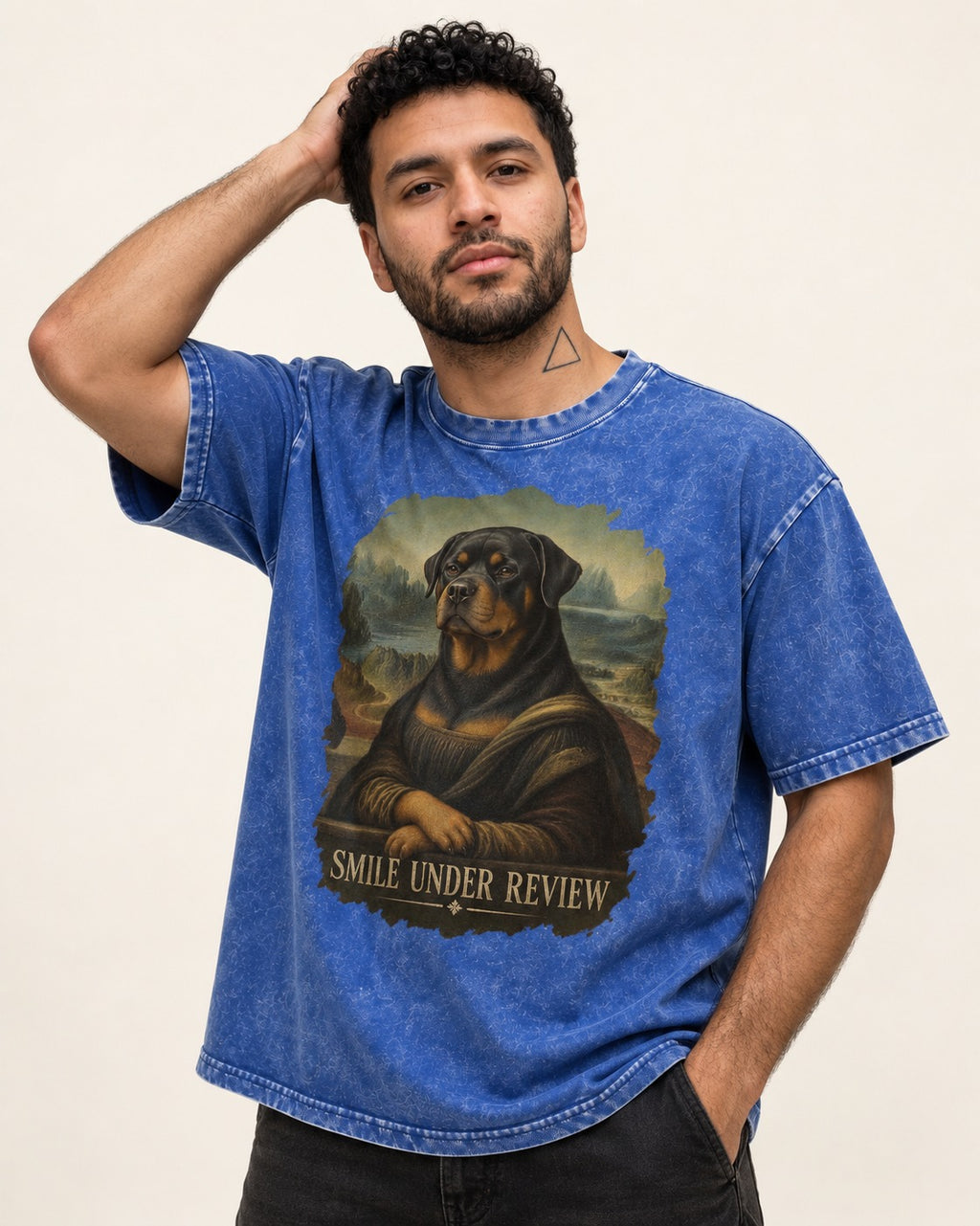 Rottweiler Smile Under Review Renaissance Portrait Graphic Washed Tee in Royal Blue, worn by a model