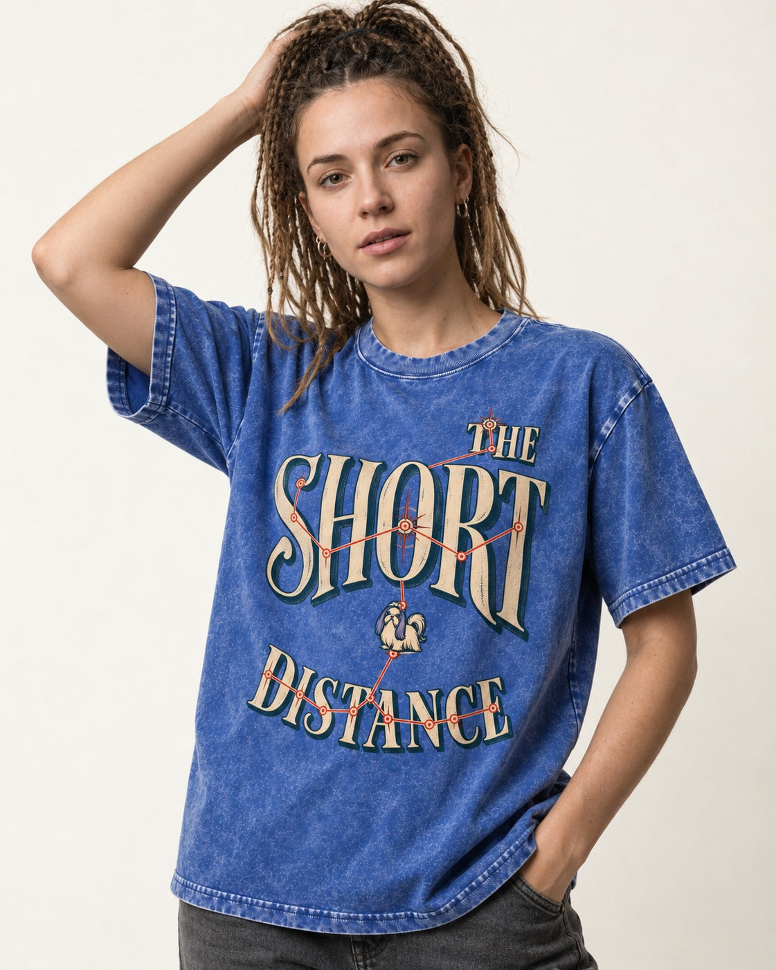Shih Tzu The Short Distance Route Graphic Washed Tee in Royal Blue, worn by a model