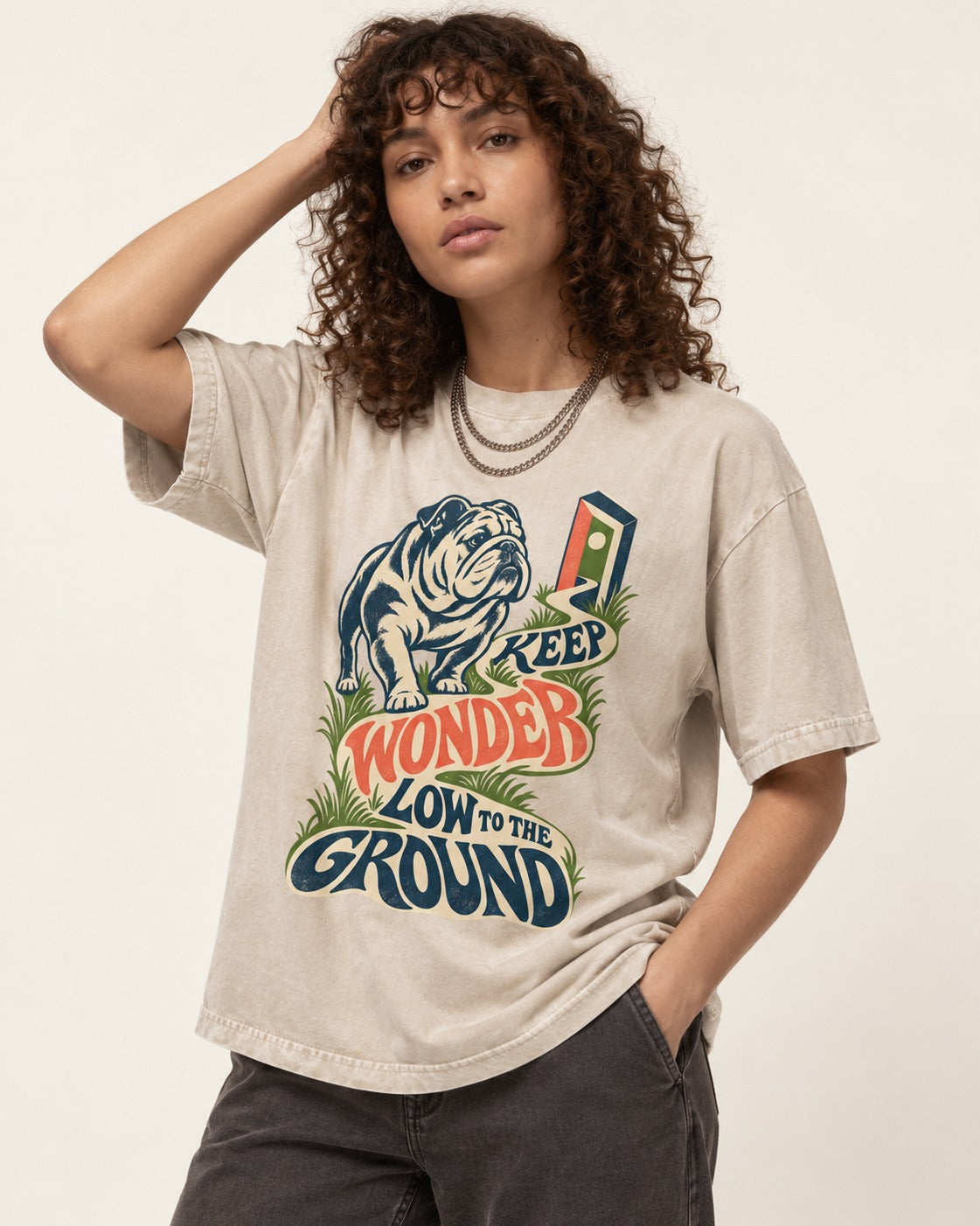 Keep Wonder Low to the Ground English Bulldog Graphic Washed Tee in Apricot, worn by a model