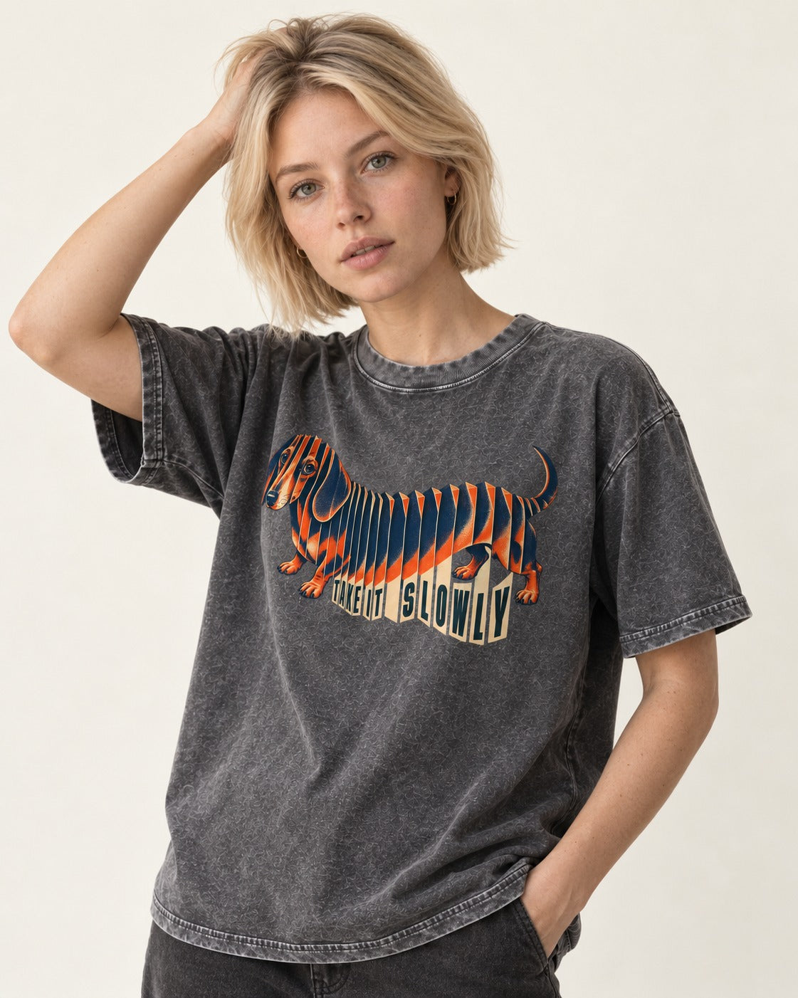 Take It Slowly Dachshund Washed Tee in Gray, worn by a model