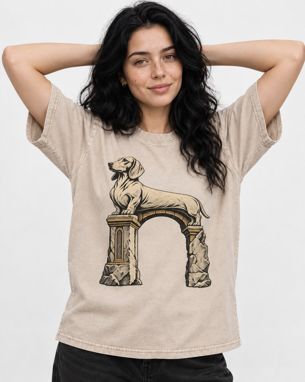 Dachshund Ruined Stone Arch Monument Graphic Washed Tee in Apricot, worn by a model