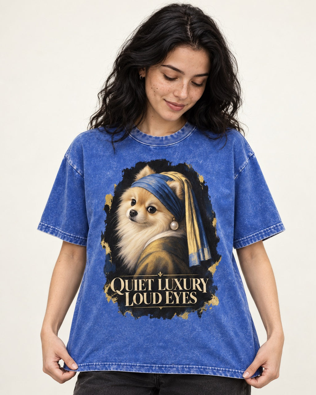 Pomeranian Quiet Luxury Loud Eyes Pearl Portrait Graphic Washed Tee in Royal Blue, worn by a model