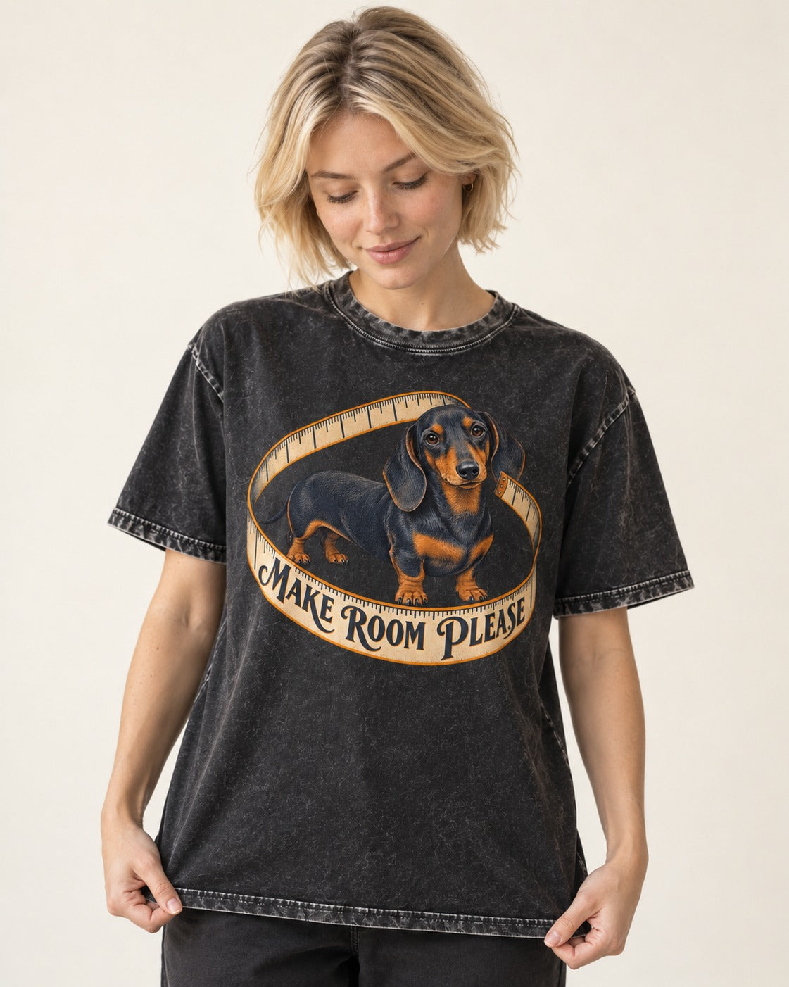 Dachshund Make Room Please Measuring Tape Graphic Washed Tee in Black, worn by a model