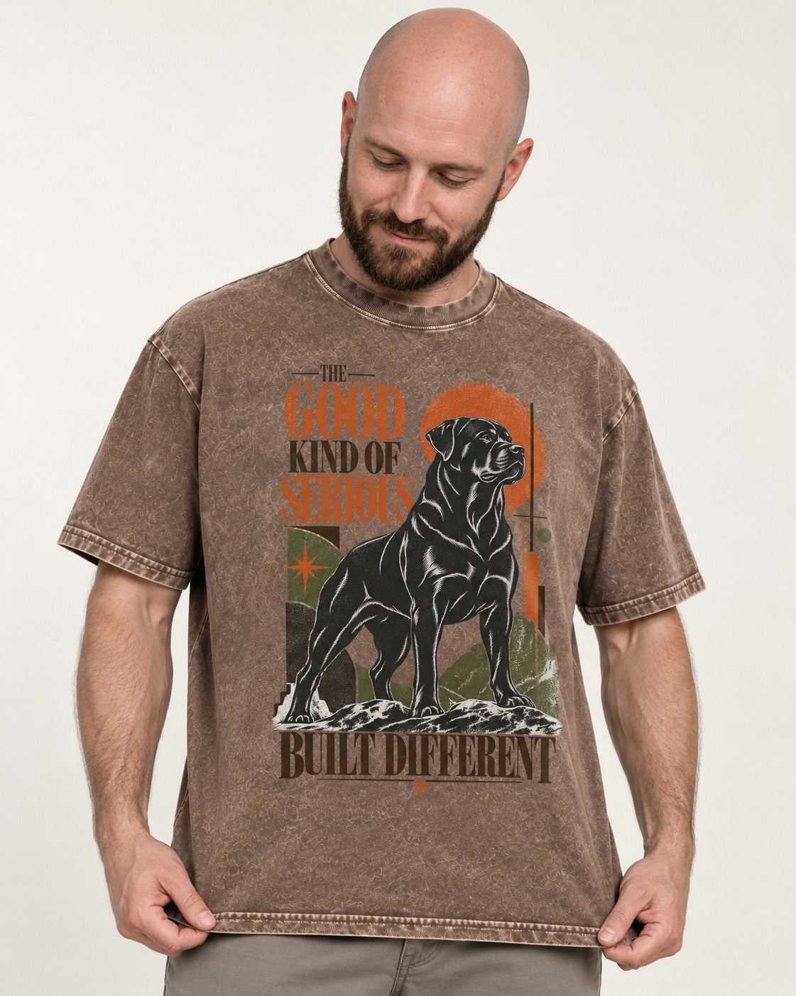 Rottweiler Built Different Washed Tee in Coffee, worn by a model