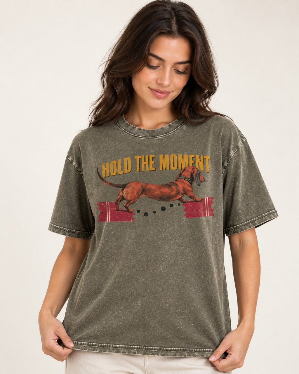 Dachshund Hold The Moment Torn Ticket Bridge Graphic Washed Tee in Army Green, worn by a model
