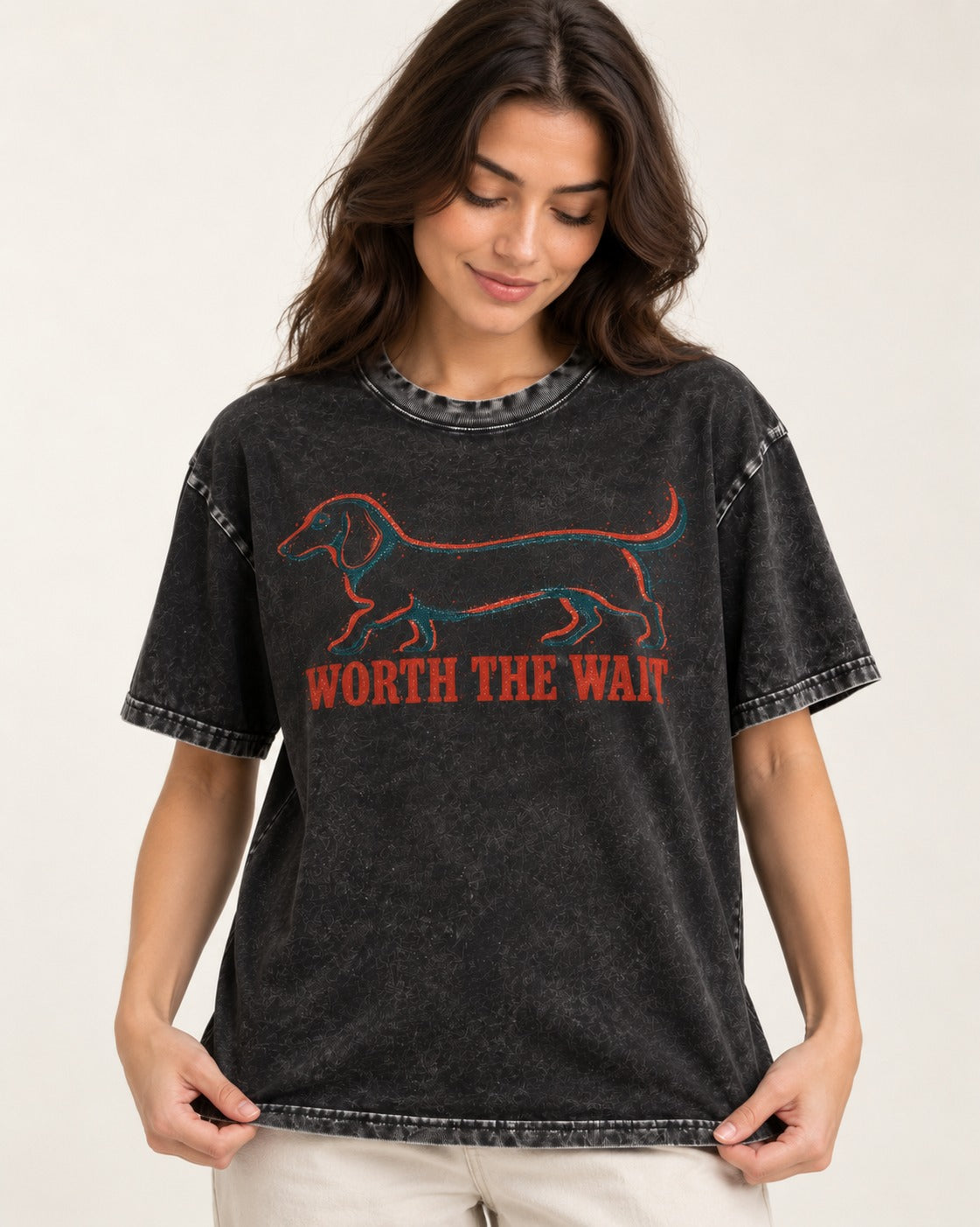 Dachshund Worth The Wait Distressed Outline Graphic Washed Tee in Black, worn by a model