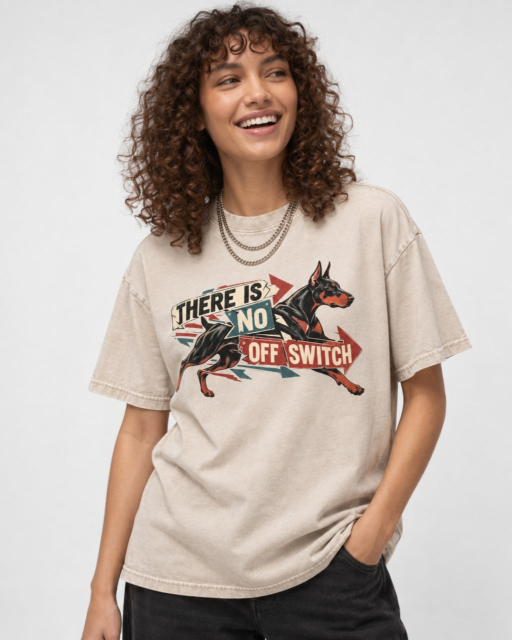 Doberman There Is No Off Switch Arrow Sprint Graphic Washed Tee in Apricot, worn by a model