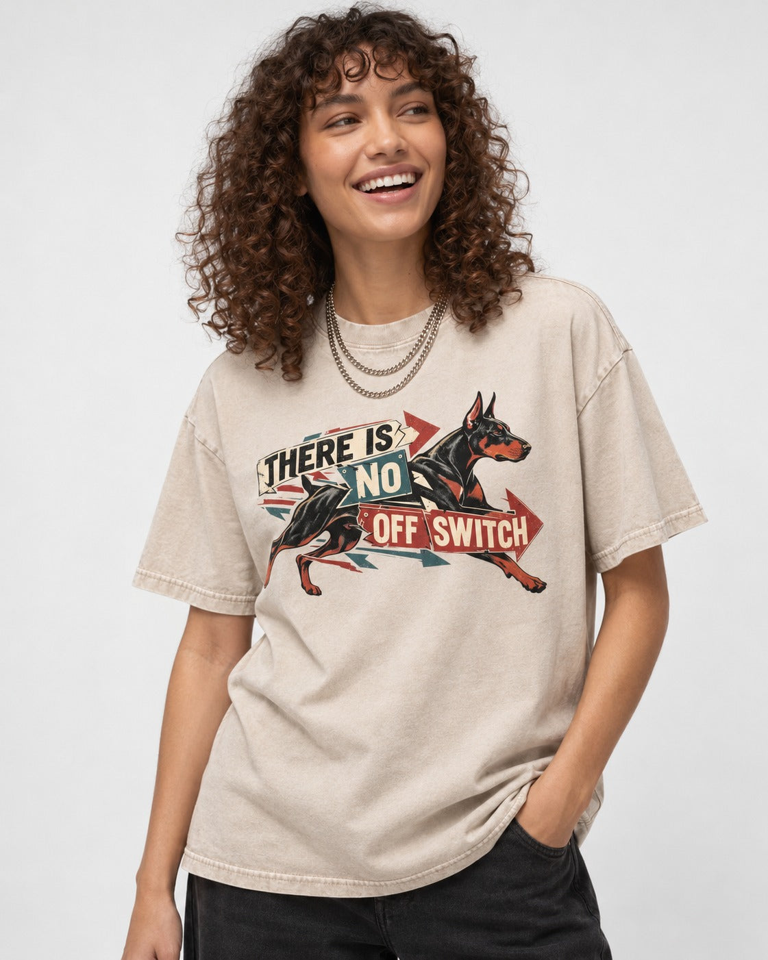 Doberman There Is No Off Switch Arrow Sprint Graphic Washed Tee in Apricot, worn by a model