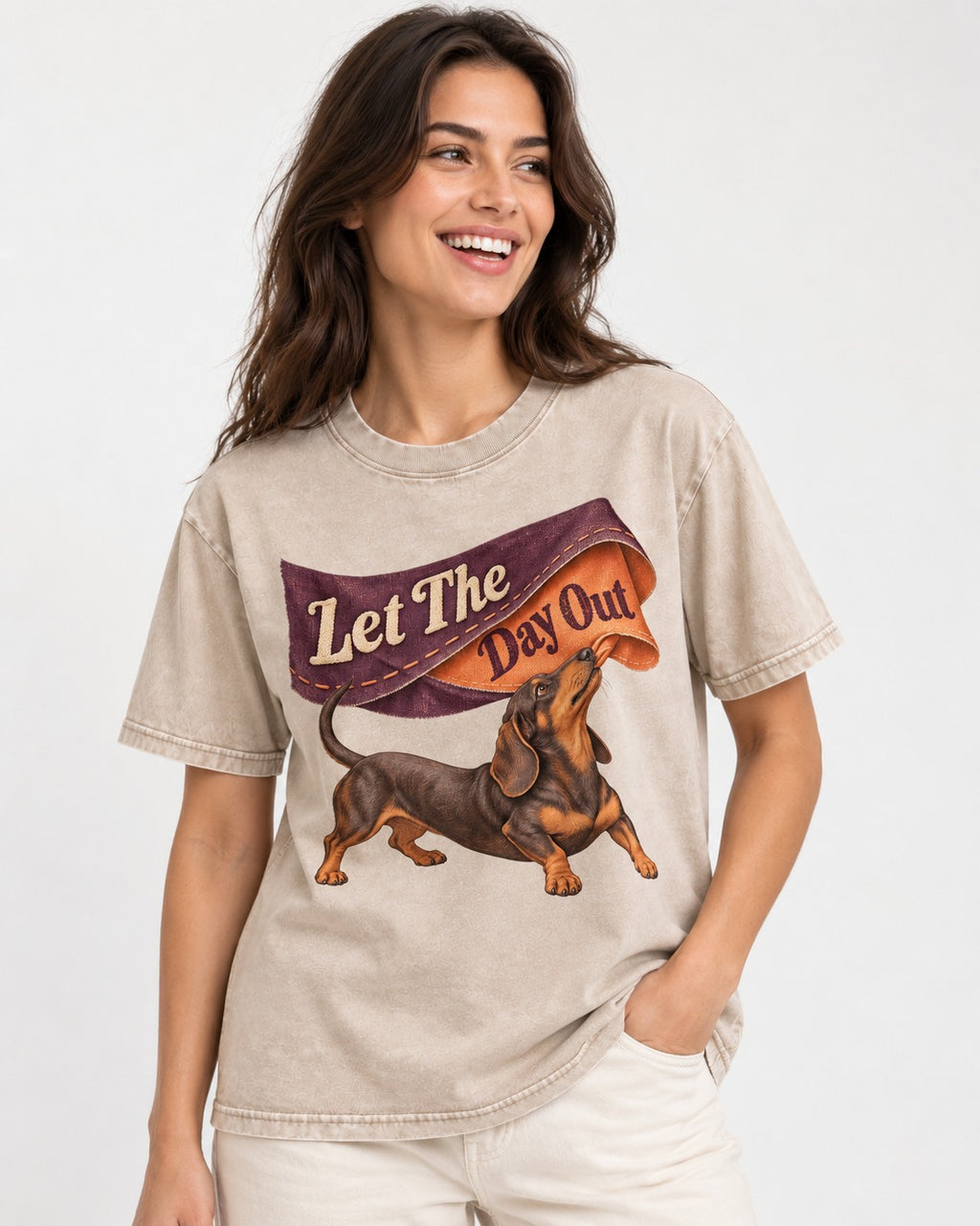 Dachshund Let The Day Out Fabric Banner Graphic Washed Tee in Apricot, worn by a model